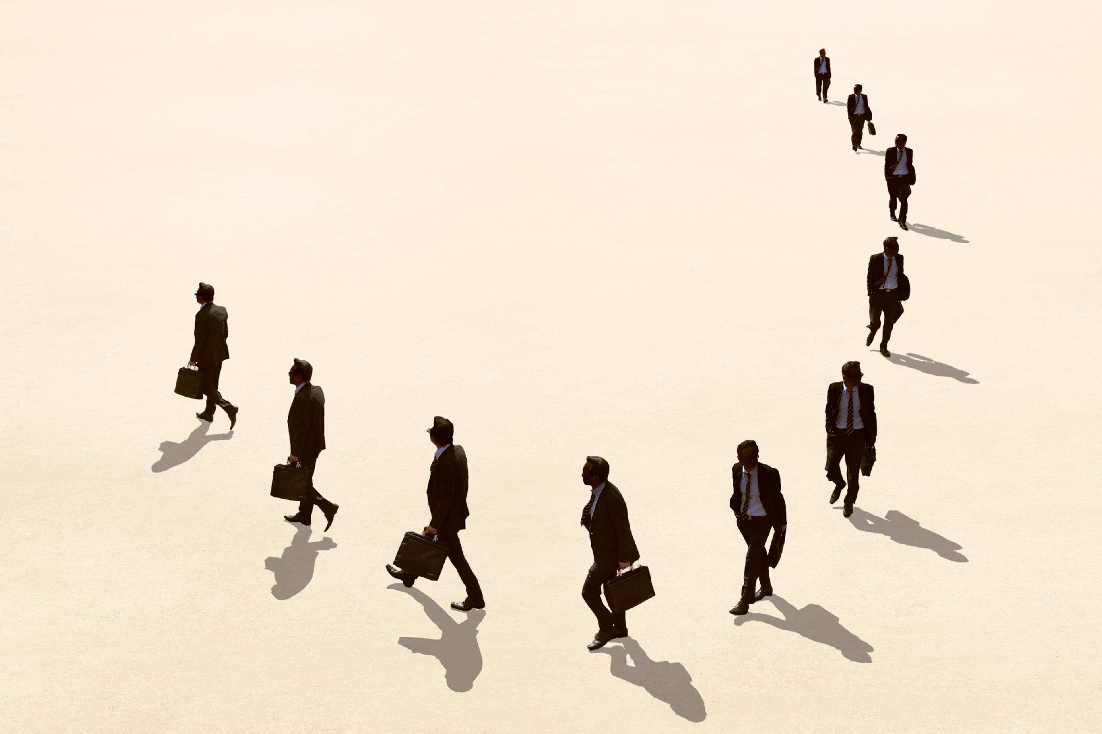 Businessman walking in circle