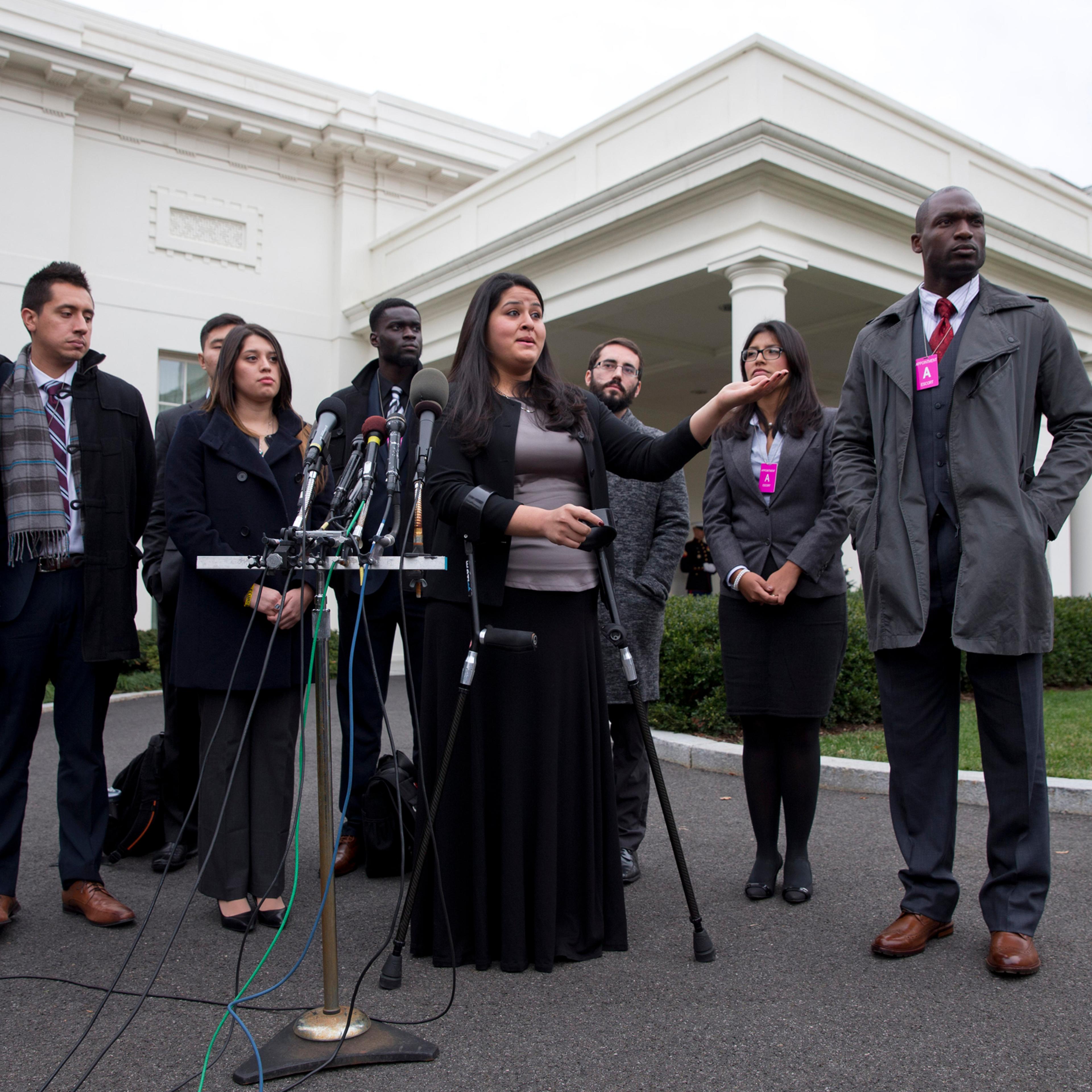 Lorella Praeli representing the group United We DREAM, with a group of immigrant youth who were eligible for the president's deferred action, speaks to the media on Dec. 4, 2014.