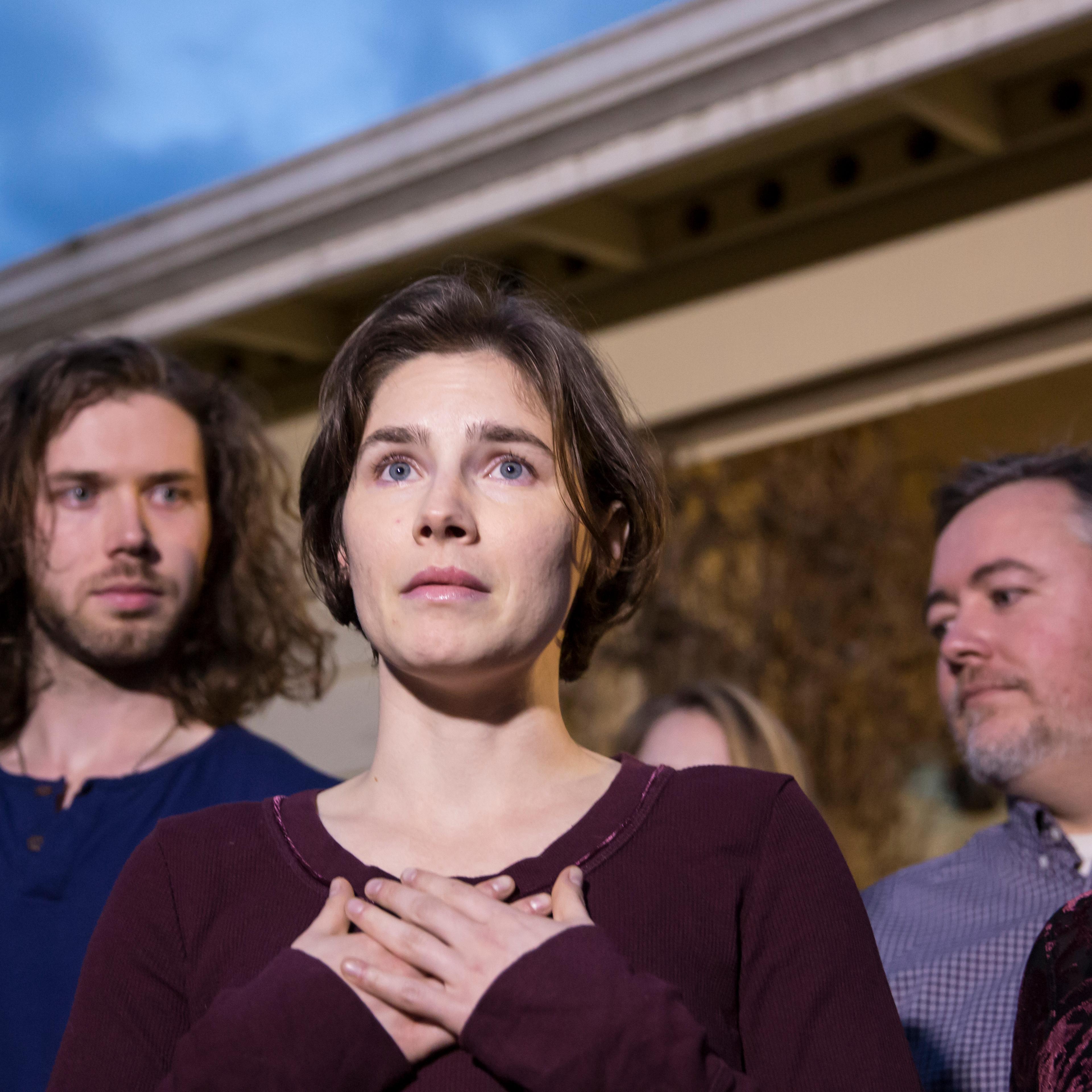 Amanda Knox speaks to the media during a brief press conference in front of her parents' home in Seattle on March 27, 2015.