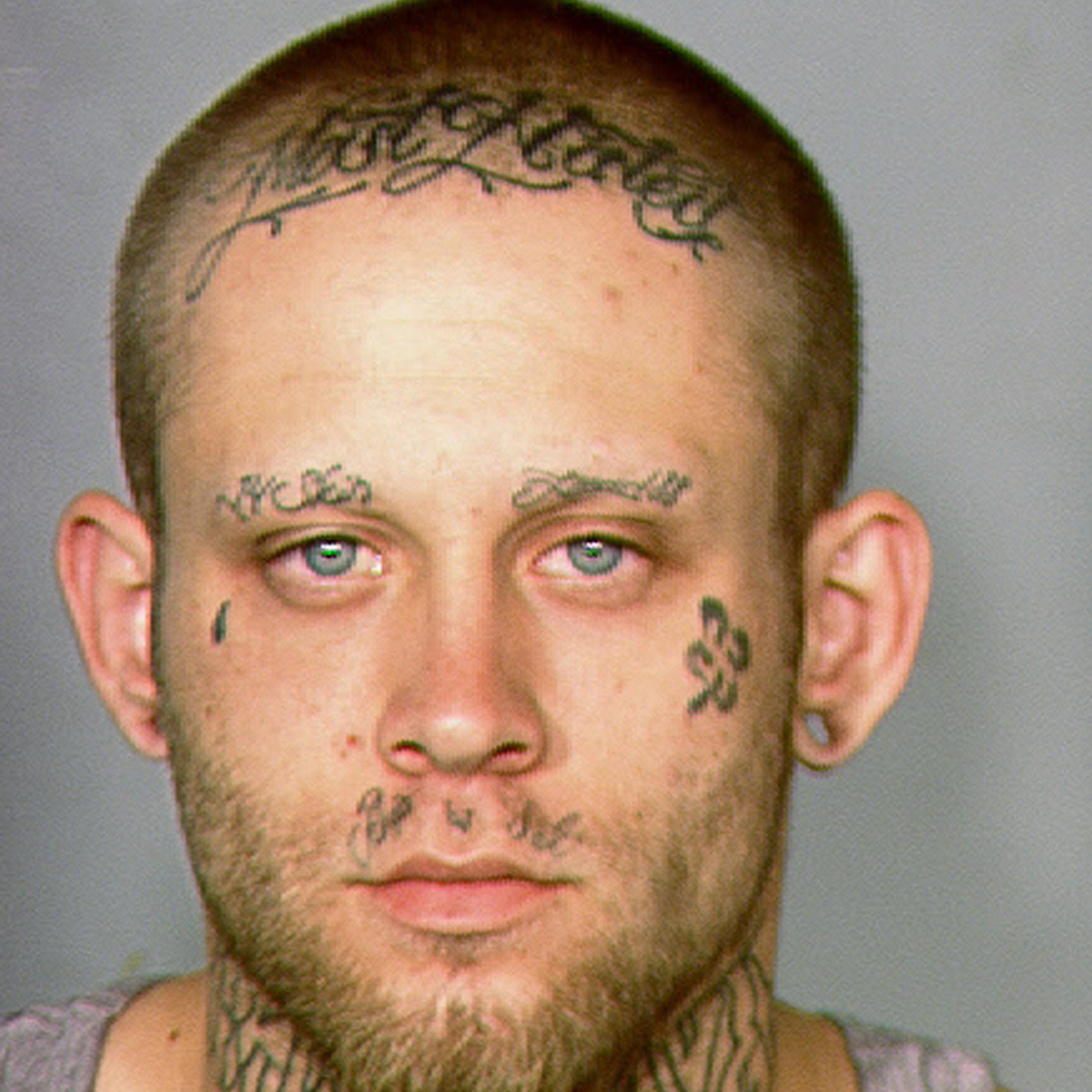 This 2013 law enforcement booking photo provided by the Las Vegas Metropolitan Police Department shows Bayzle Morgan.