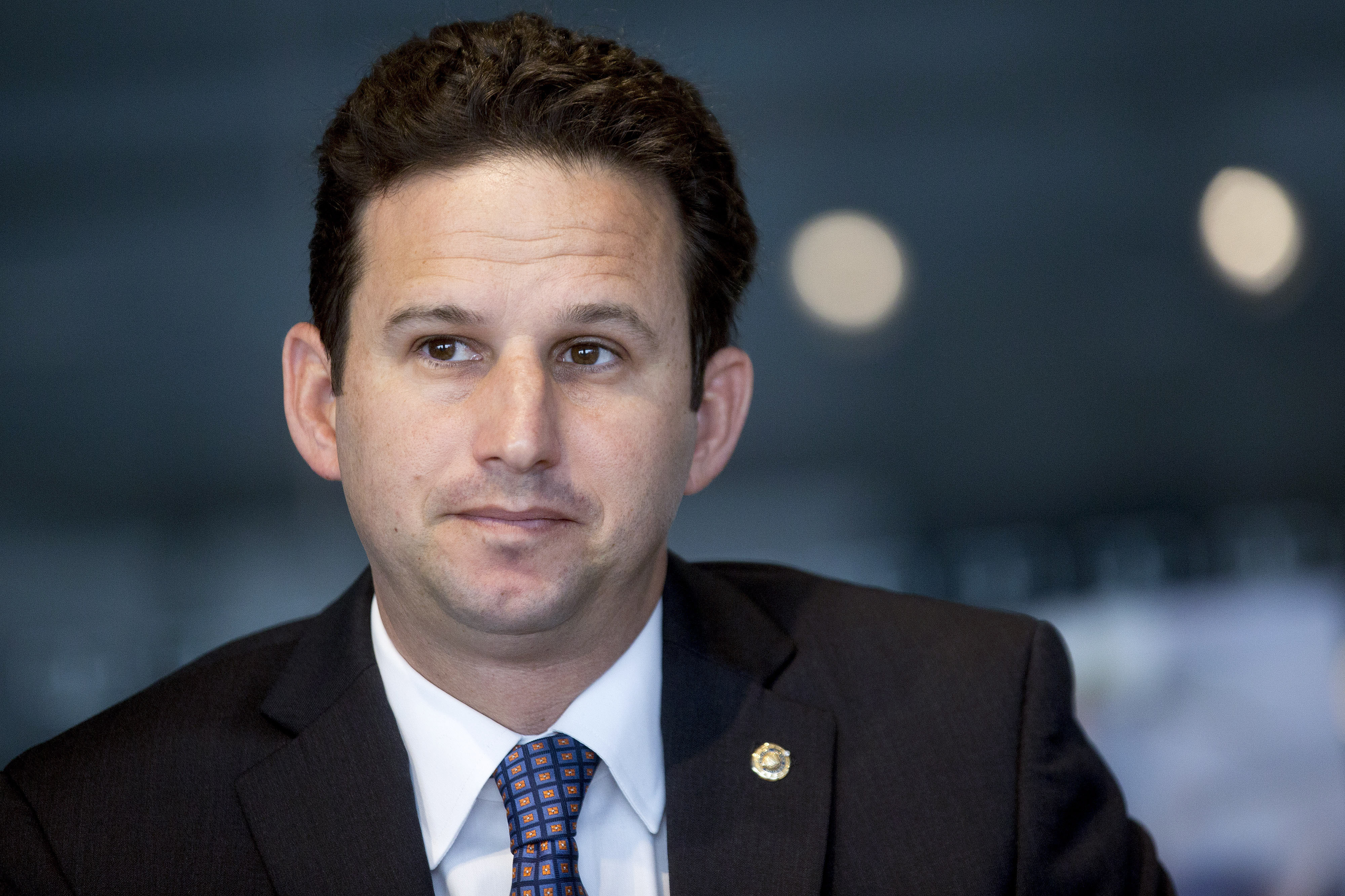 Senator Brian Schatz, a Democrat from Hawaii, listens to a question during an interview in Washington, D.C., U.S., on May 7, 2015.
