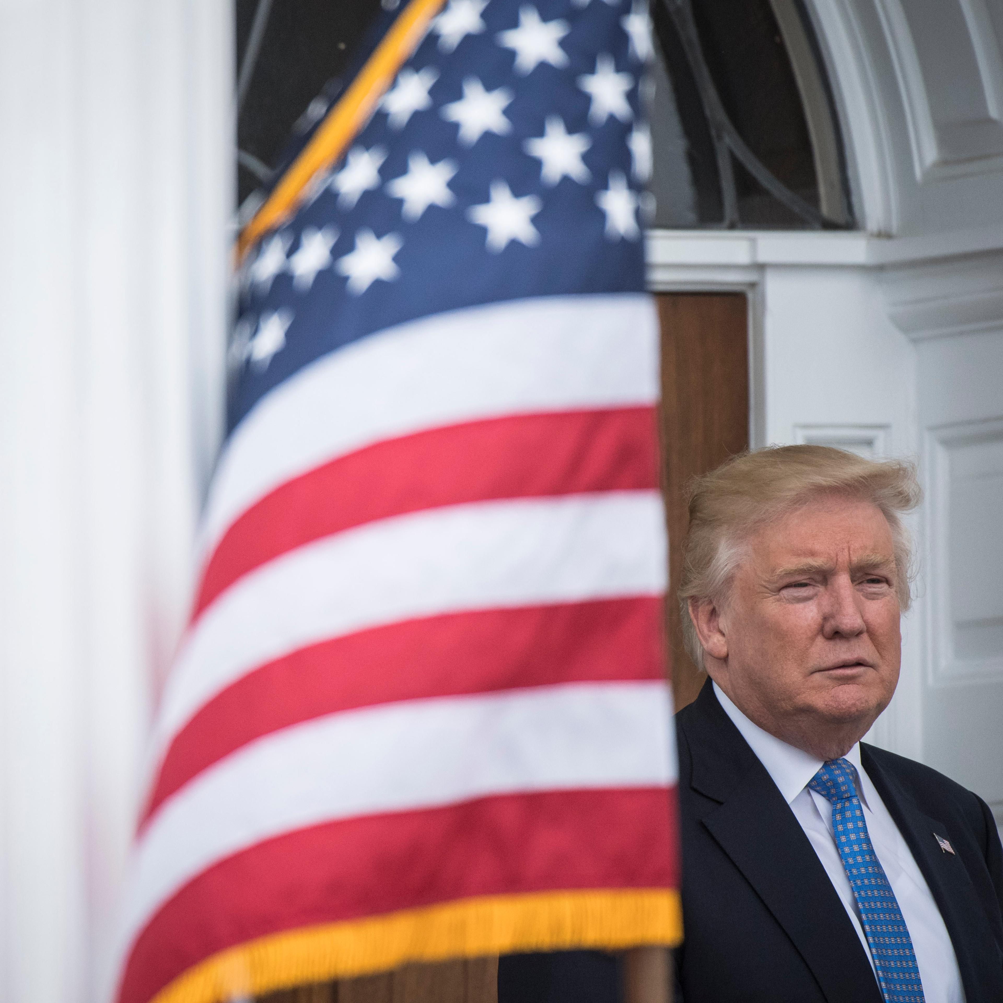 President-elect Donald Trump walks out at the clubhouse at Trump National Golf Club Bedminster in Bedminster Township, N.J. on Nov. 20, 2016.