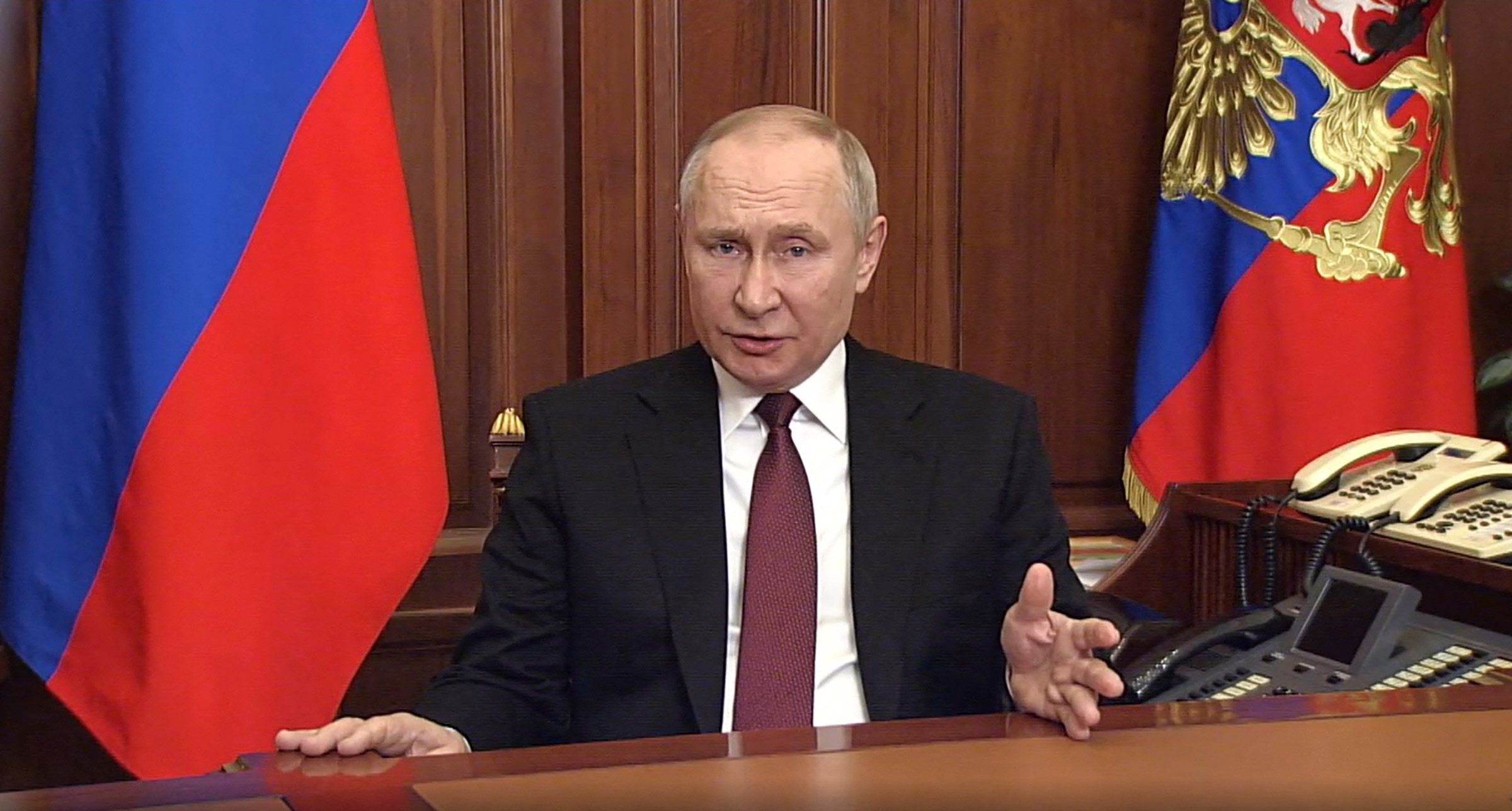 A video grab taken from footage on the official web site of Russian President Vladimir Putin as he addresses the nation at the Kremlin in Moscow early on Feb. 24, 2022. Putin announced a "military operation" in Ukraine and called on soldiers there to lay down their arms, defying Western outrage and global appeals not to launch a war.