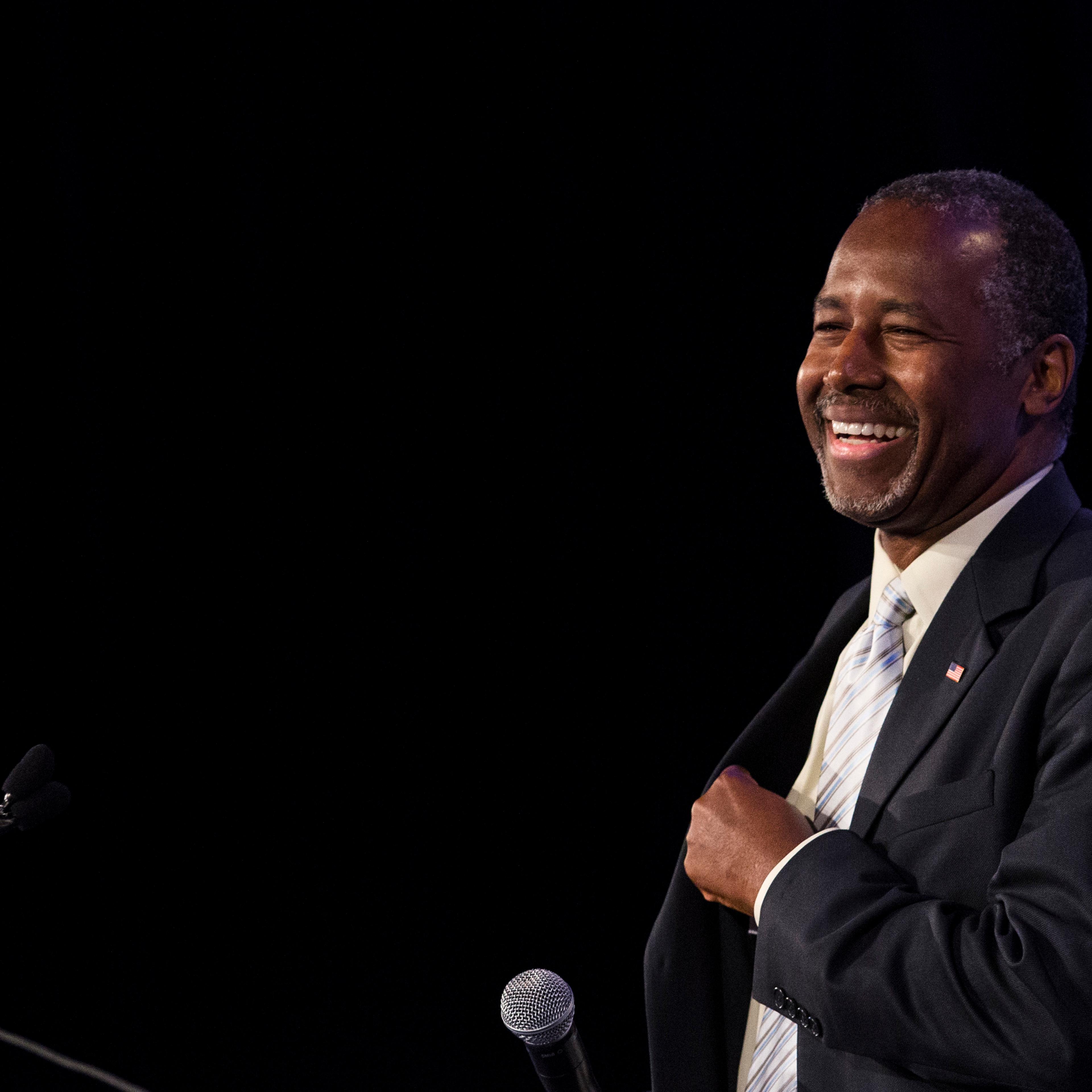 Ben Carson, 2016 Republican presidential candidate, smiles while arriving onstage to speak during the Values Voter Summit on Sept. 25, 2015 in Washington, D.C.