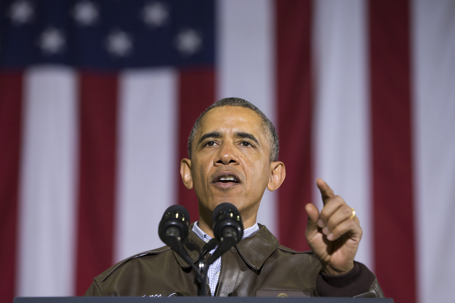 President Barack Obama gestures while speaking to troops at Bagram Air Field north of Kabul, Afghanistan, during an unannounced visit, May 25, 2014.