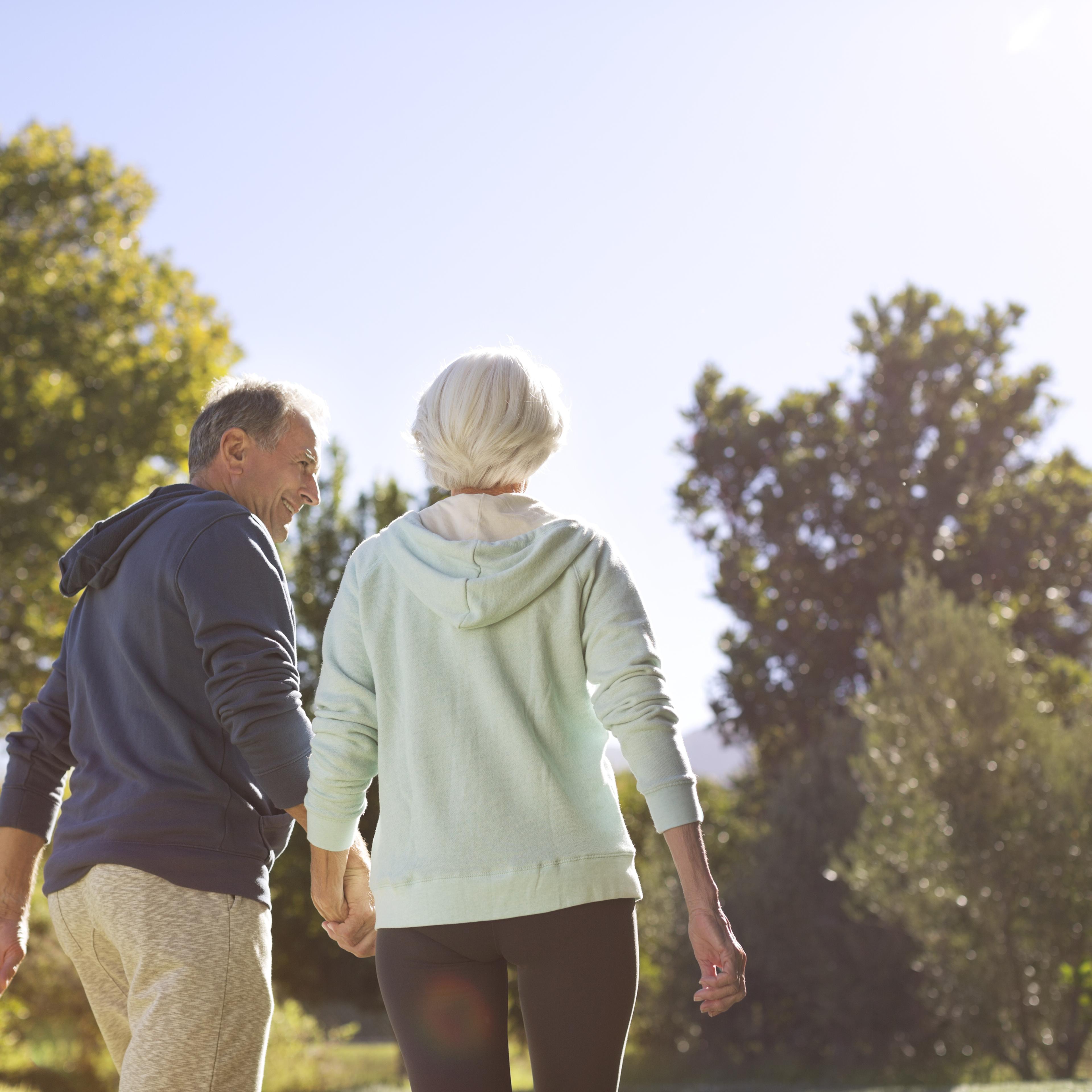 senior-couple-holding-hands