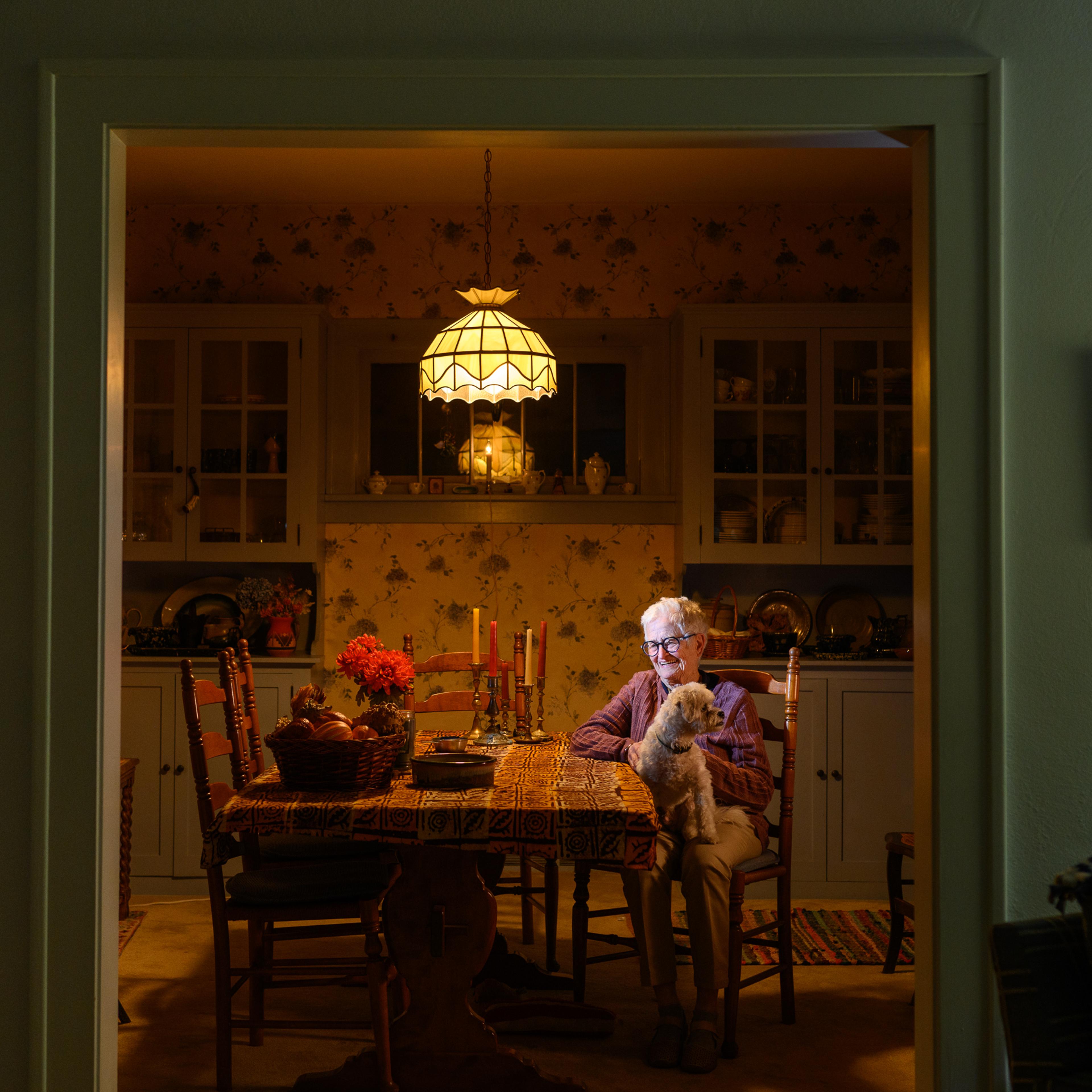 Linda Houston at her dining room table in Wooster, OH.