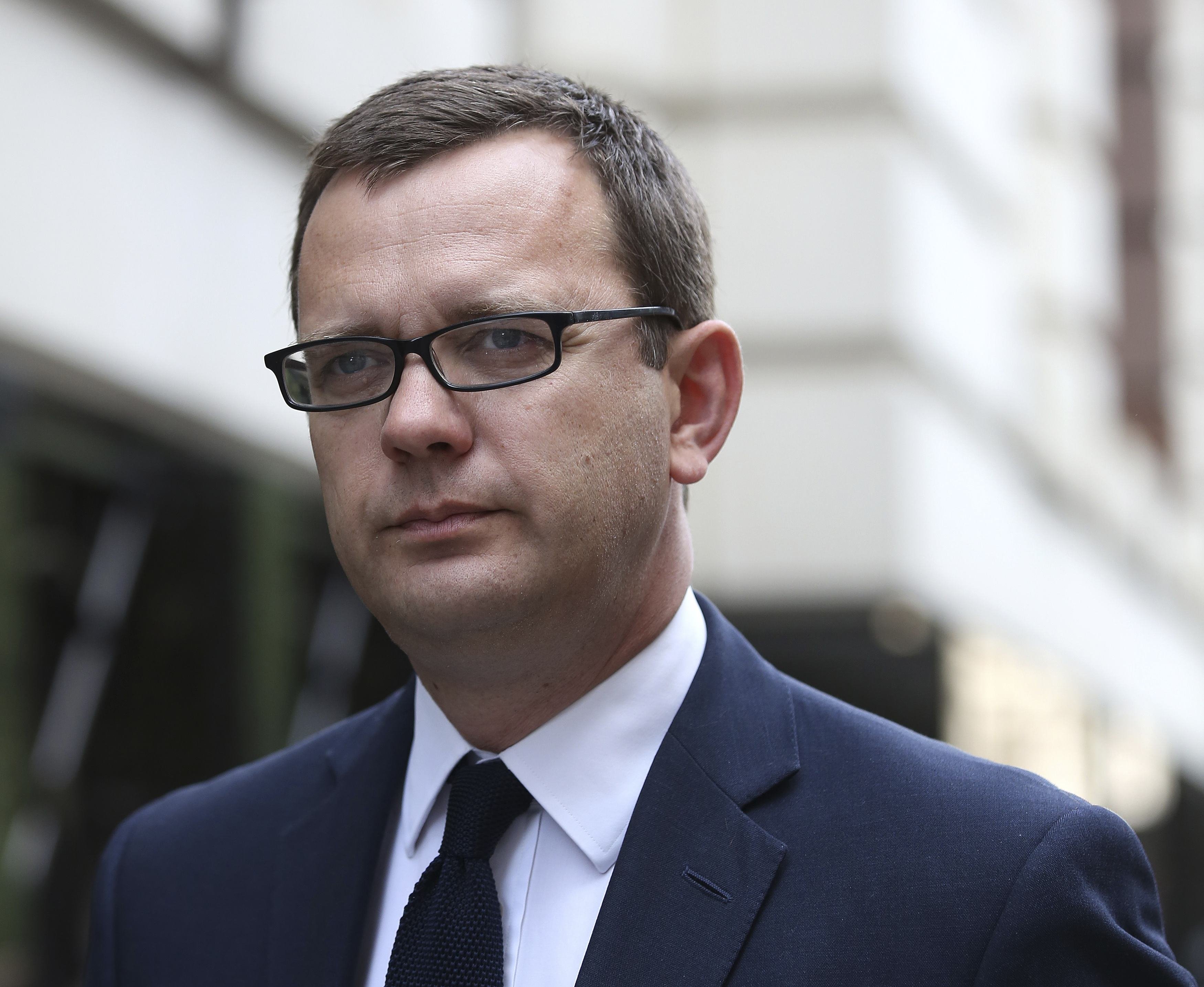 Former Editor of the News of the World Andy Coulson arrives at the Old Bailey in London on June 24, 2014.