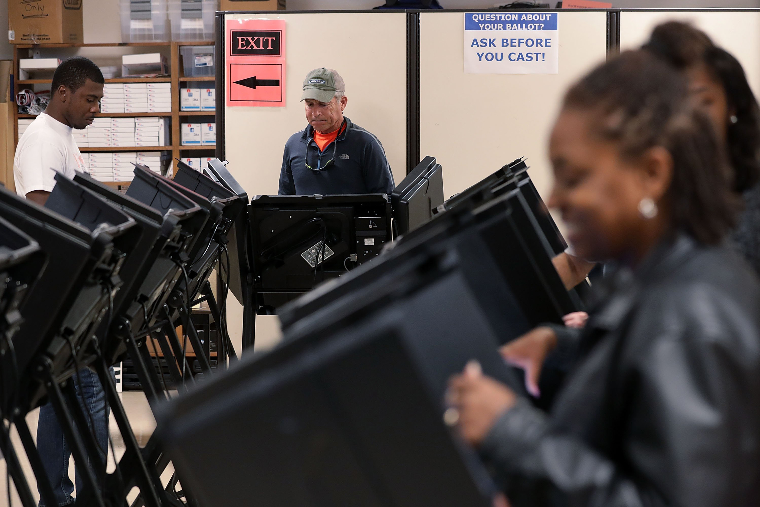 WINSTON-SALEM, NC - OCTOBER 28: Voters cast their ballots during early voting for the 2016 general election at Forsyth County Government Center October 28, 2016 in Winston-Salem, North Carolina. Early voting has begun in North Carolina through November 5