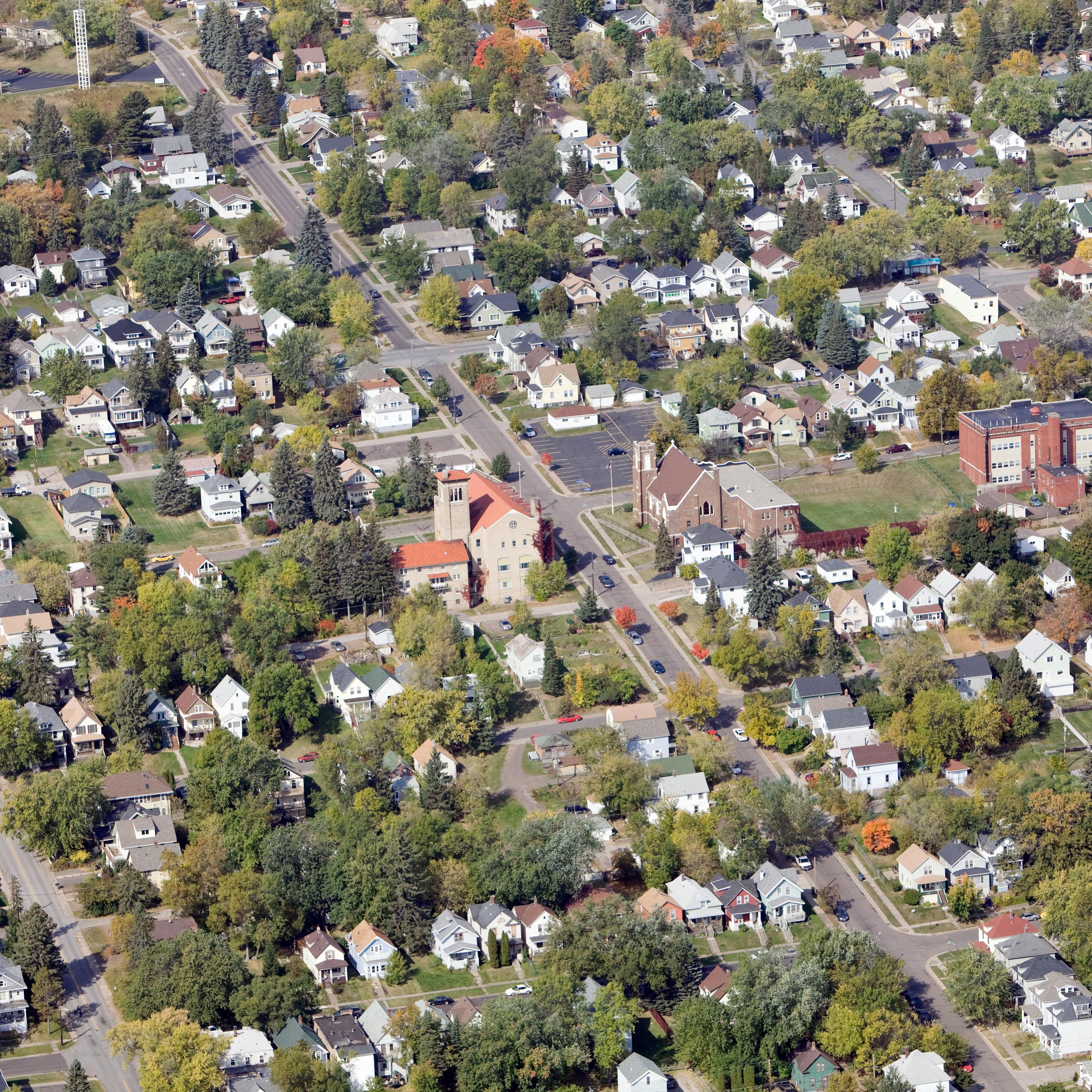 Residential Neighborhood Aerial with Homes, Churches and a School