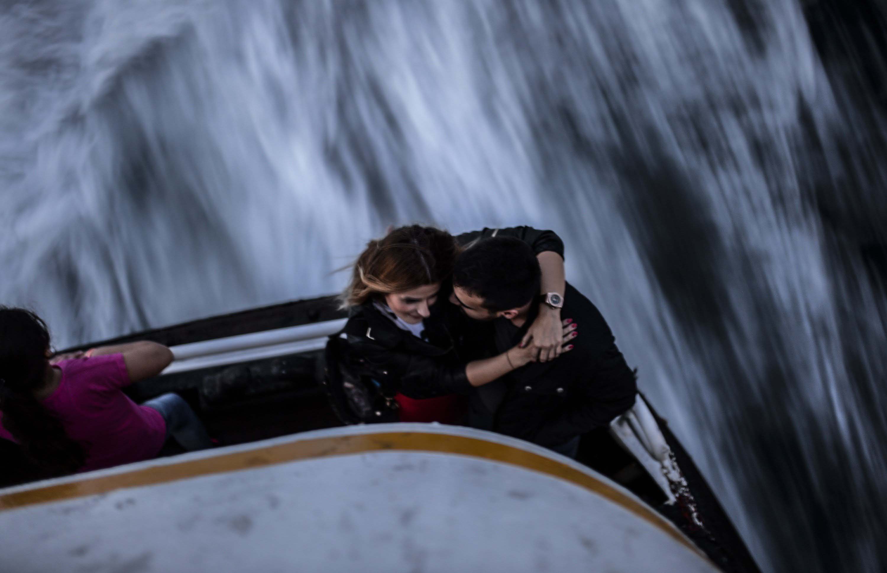 A Turkish couple share a romantic sunset at the back of a ferry on the Bosphorus, in Istanbul, on Oct. 17, 2014.