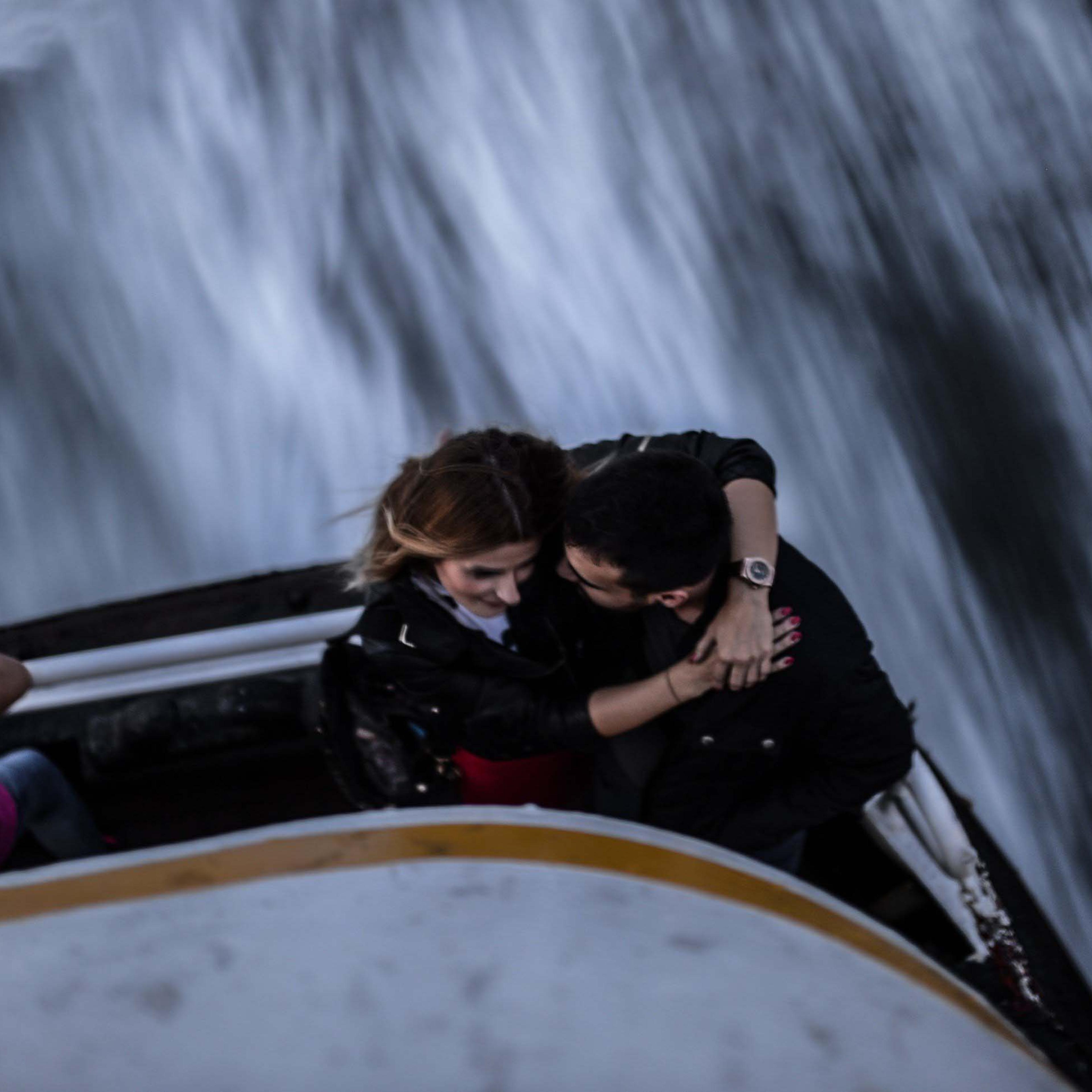 A Turkish couple share a romantic sunset at the back of a ferry on the Bosphorus, in Istanbul, on Oct. 17, 2014.