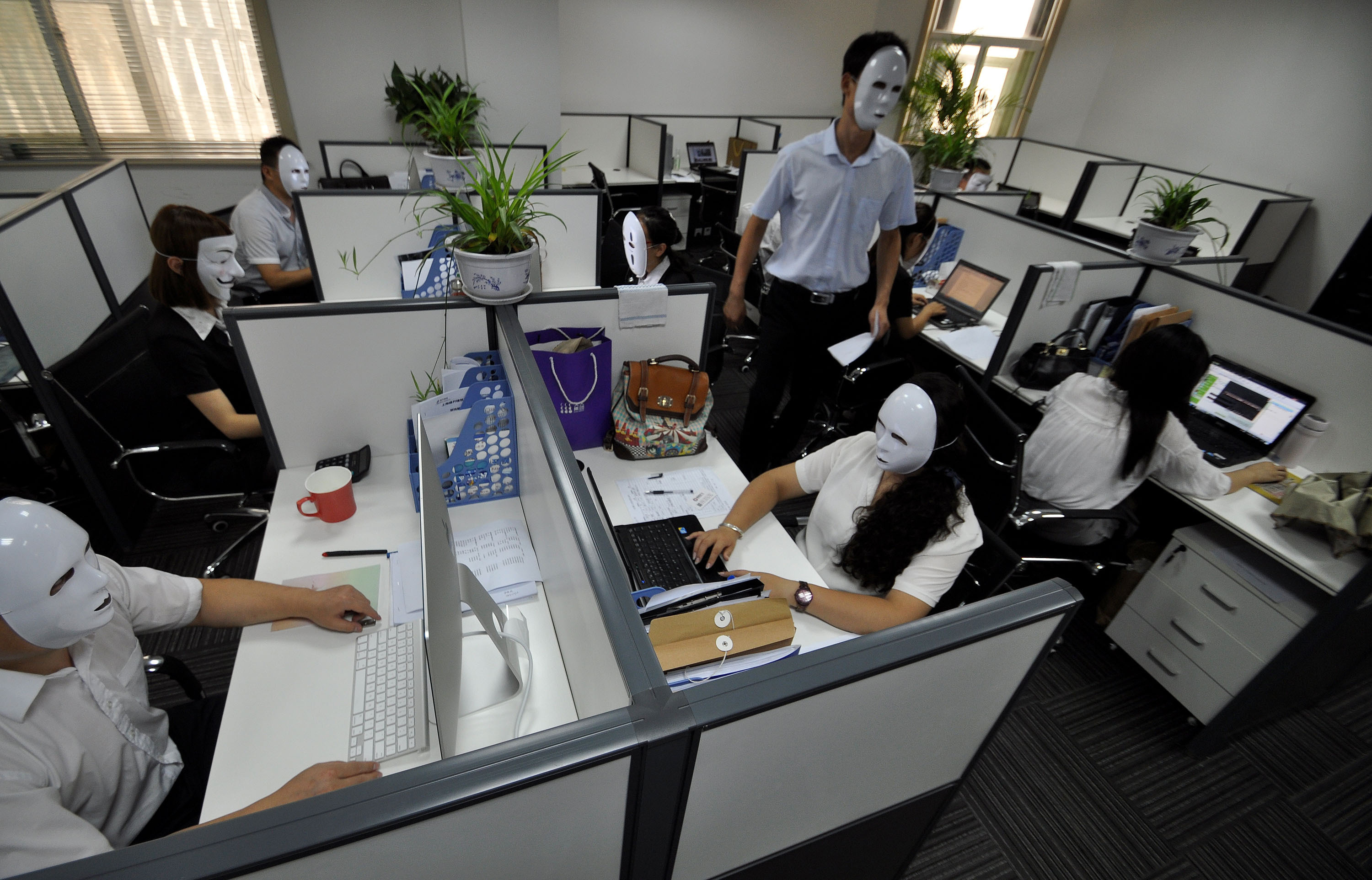 Staffs Wear No-Face Masks To Reduce Pressure During Working Time In Handan
