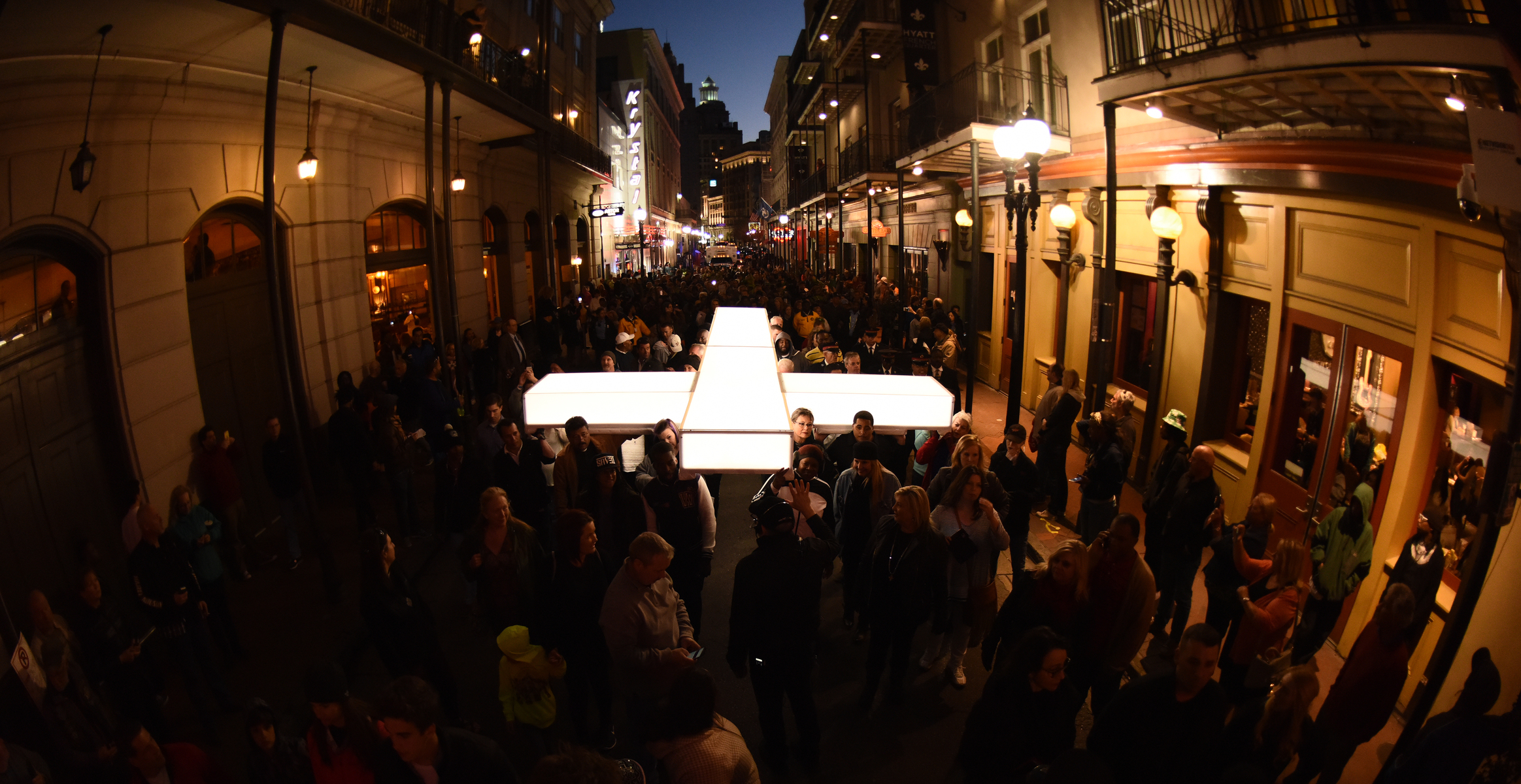The cross being carried through the streets of New Orleans in "The Passion", a two-hour epic musical Live event from New Orleans on Palm Sunday, March 20, 2016.