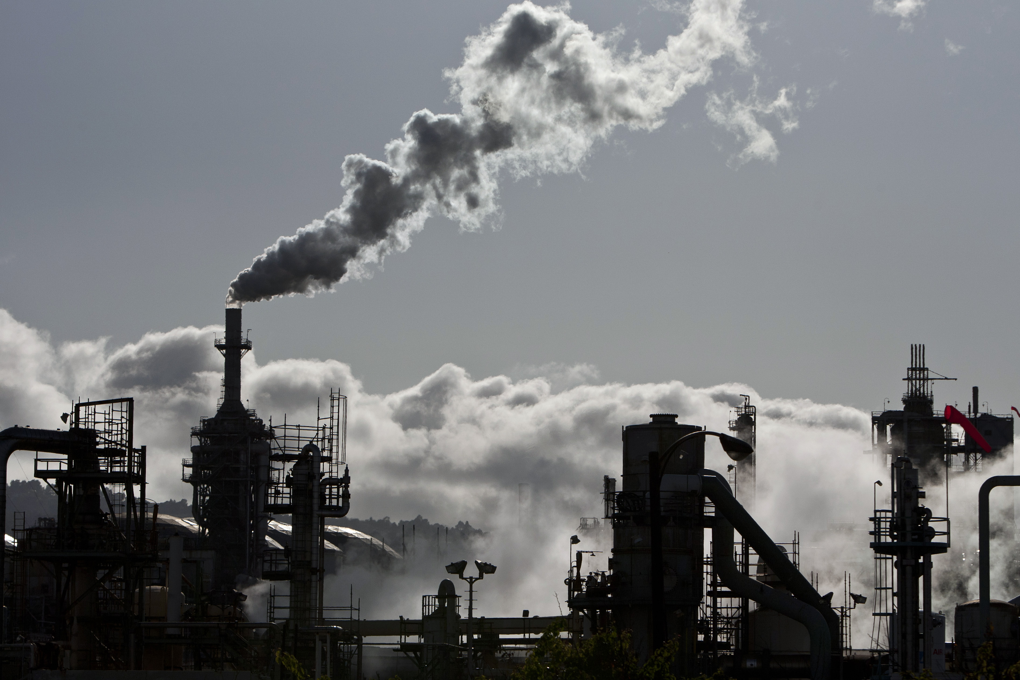 Smoke is released into the sky at an oil refinery in Wilmington