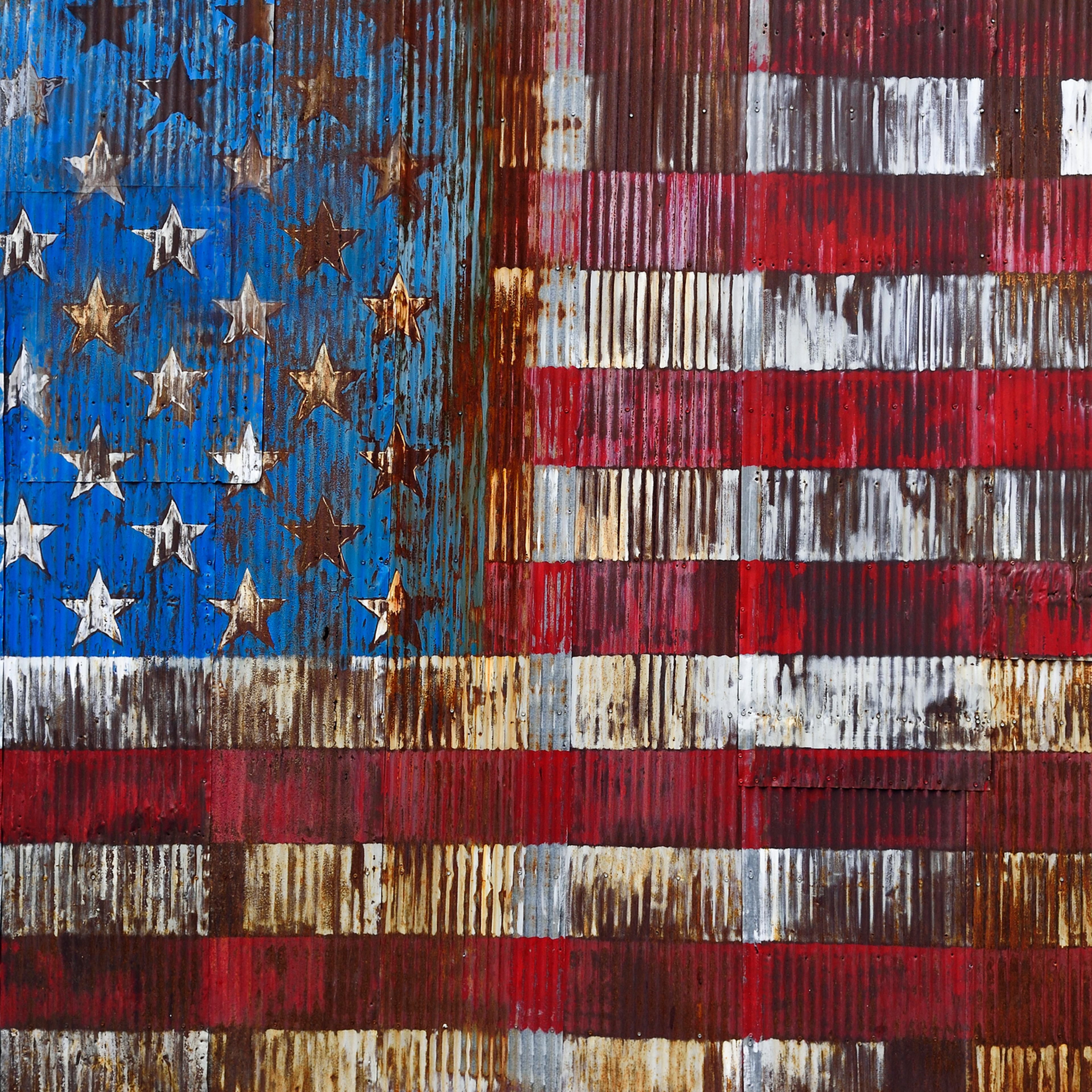 Decaying American Flag painted on a rusty door