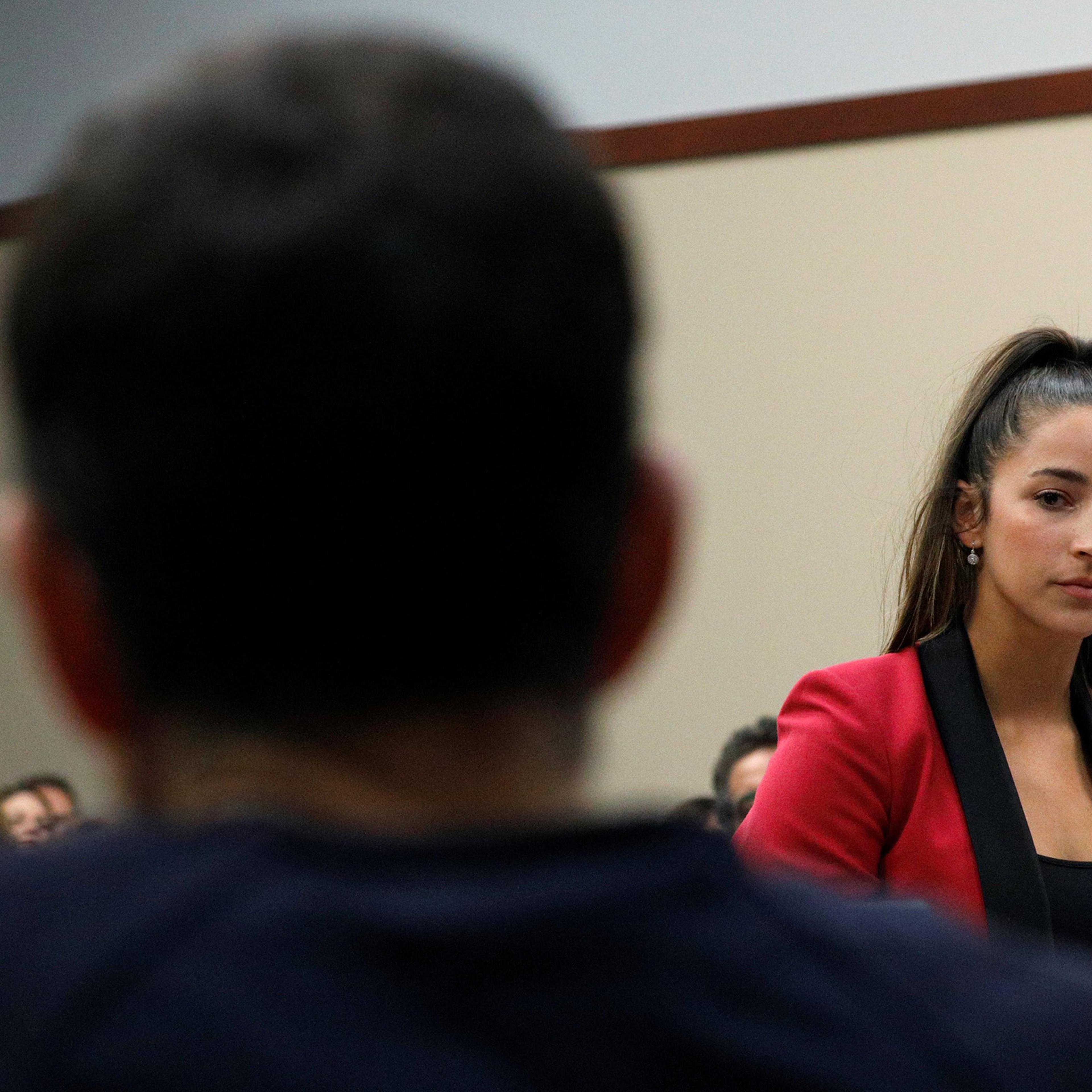 Victim and gymnast Aly Raisman speaks at the sentencing hearing for Larry Nassar, (R) a former team USA Gymnastics doctor who pleaded guilty in November 2017 to sexual assault charges, in Lansing