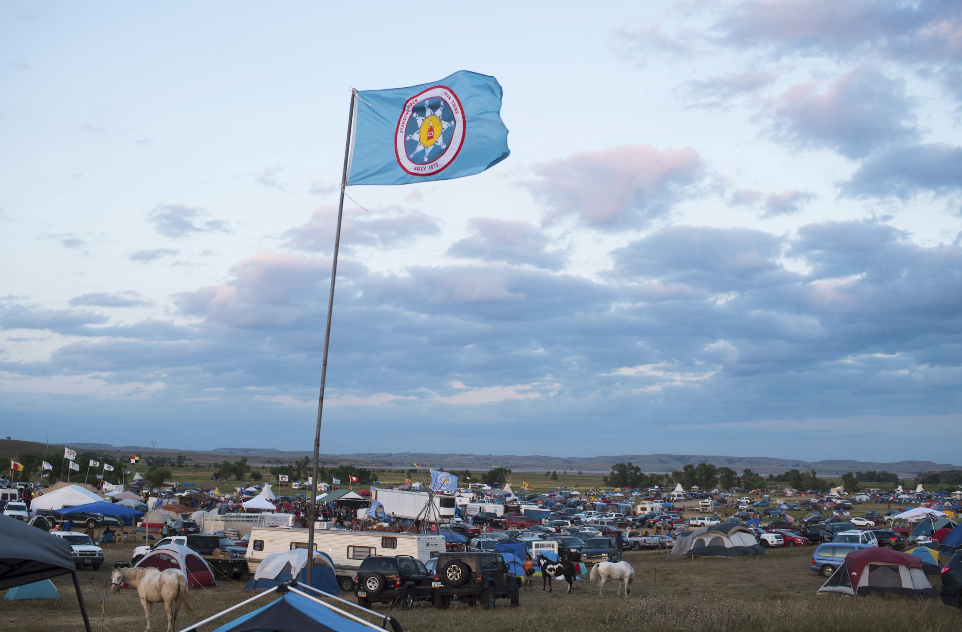 A Standing Rock Sioux flag flies over a protest encampment near Cannon Ball, North Dakota on Sept. 3, 2016.