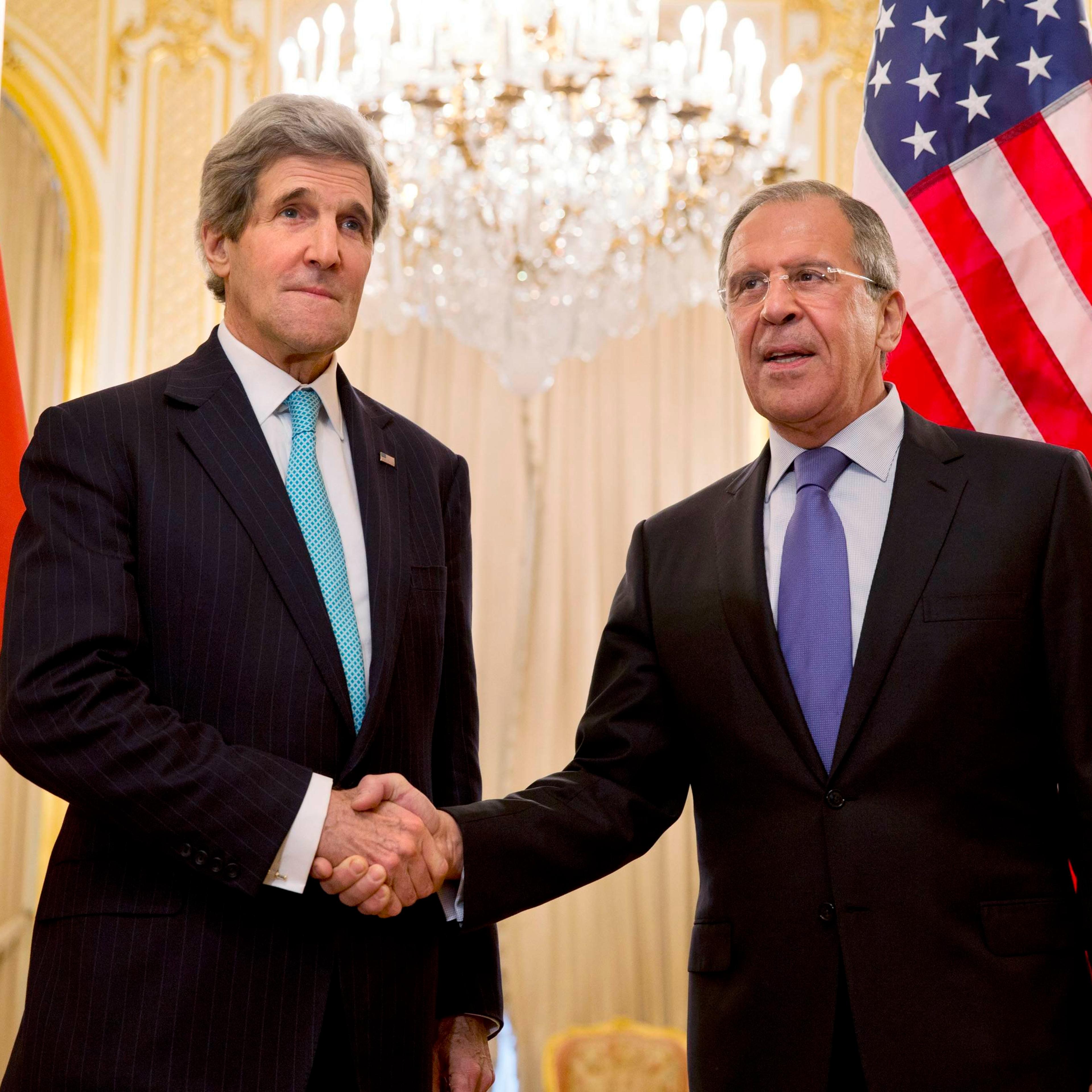 U.S. Secretary of State Kerry shakes hands with Russian Foreign Minister Lavrov at the Russian Ambassador's residence in Paris