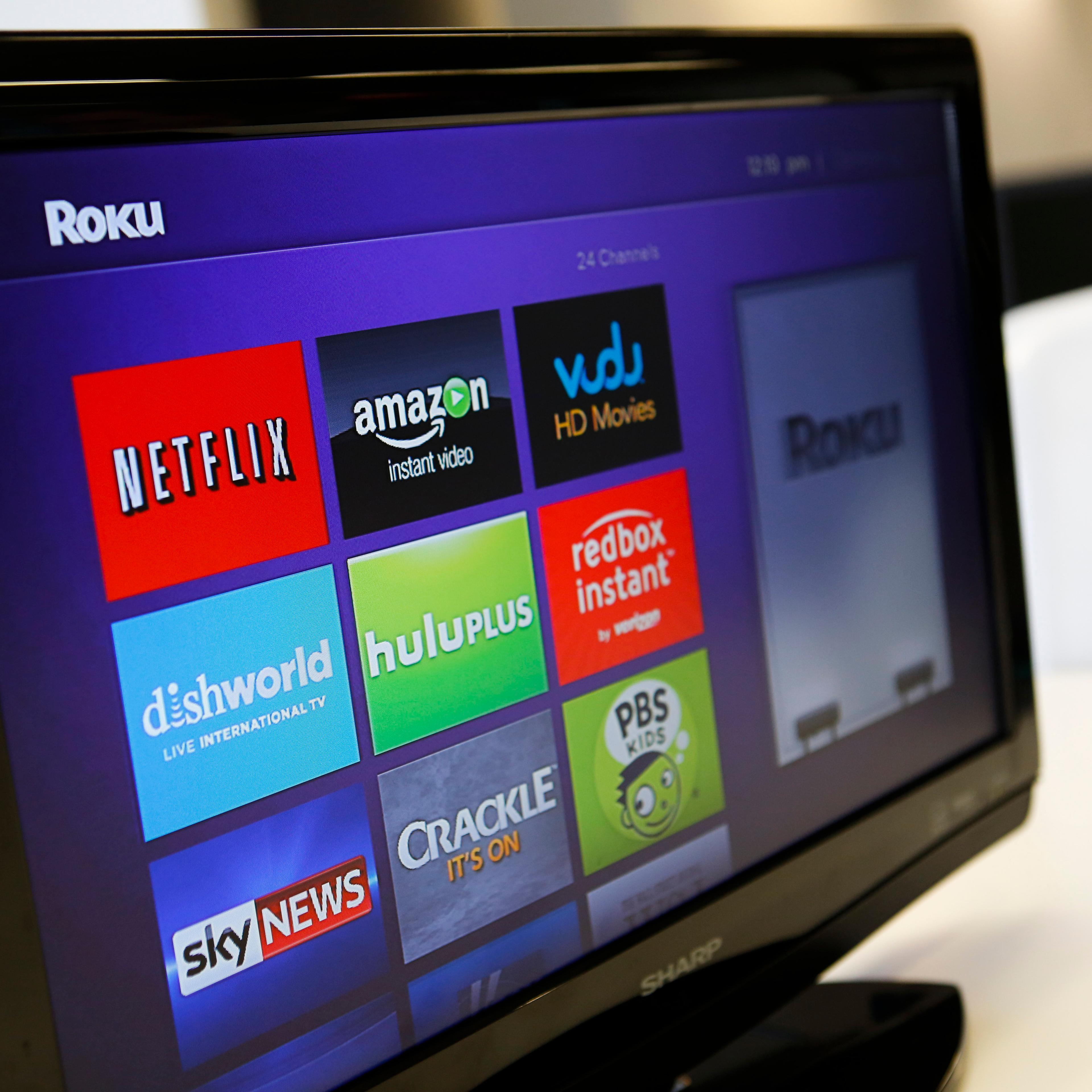 The Roku 3 television streaming player menu screen featuring Netflix, Amazon, Vudu, Hulu, and Redbox Instant is shown on a television in Los Angeles on Sept. 12, 2013.