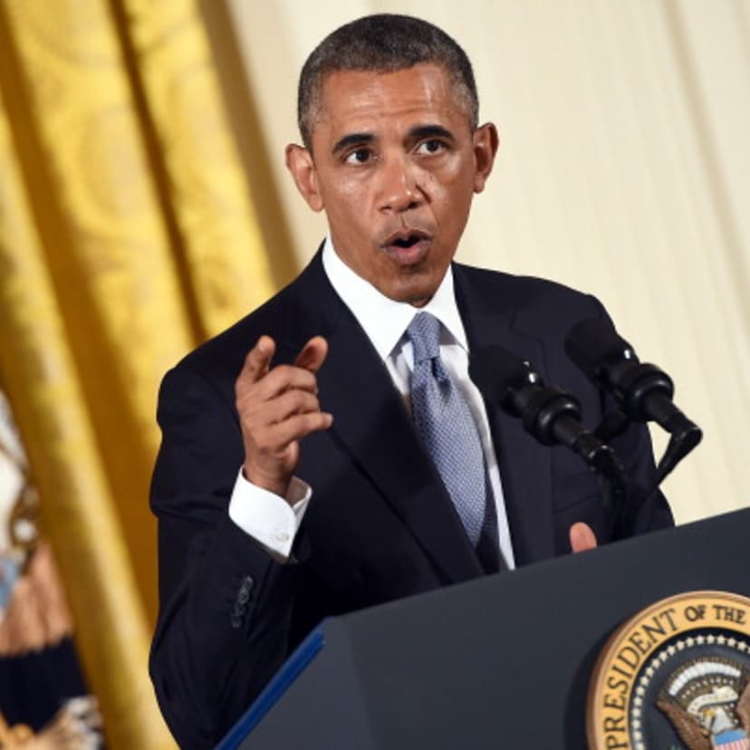 US President Barack Obama speaks before signing an Executive Order to protect LGBT (lesbian, gay, bisexual, and transgender) employees from workplace discrimination in the East Room at the White House in Washington, DC, on July 21, 2014.