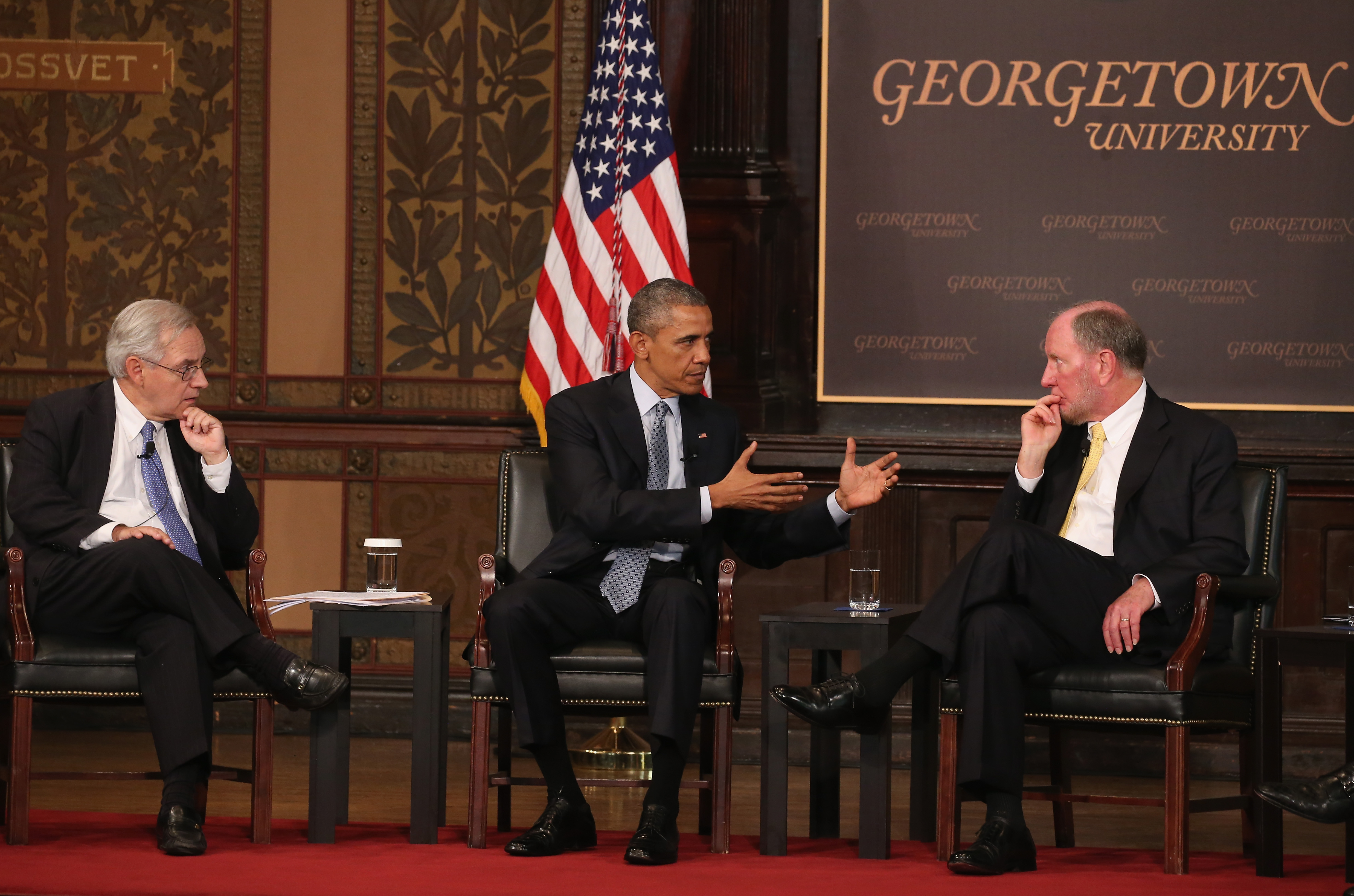 President Barack Obama participates in a discussion on poverty with moderator E.J. Dionne, Jr. and Robert Putman Professor at Harvard University, at Georgetown University May 12, 2015 in Washington, DC.