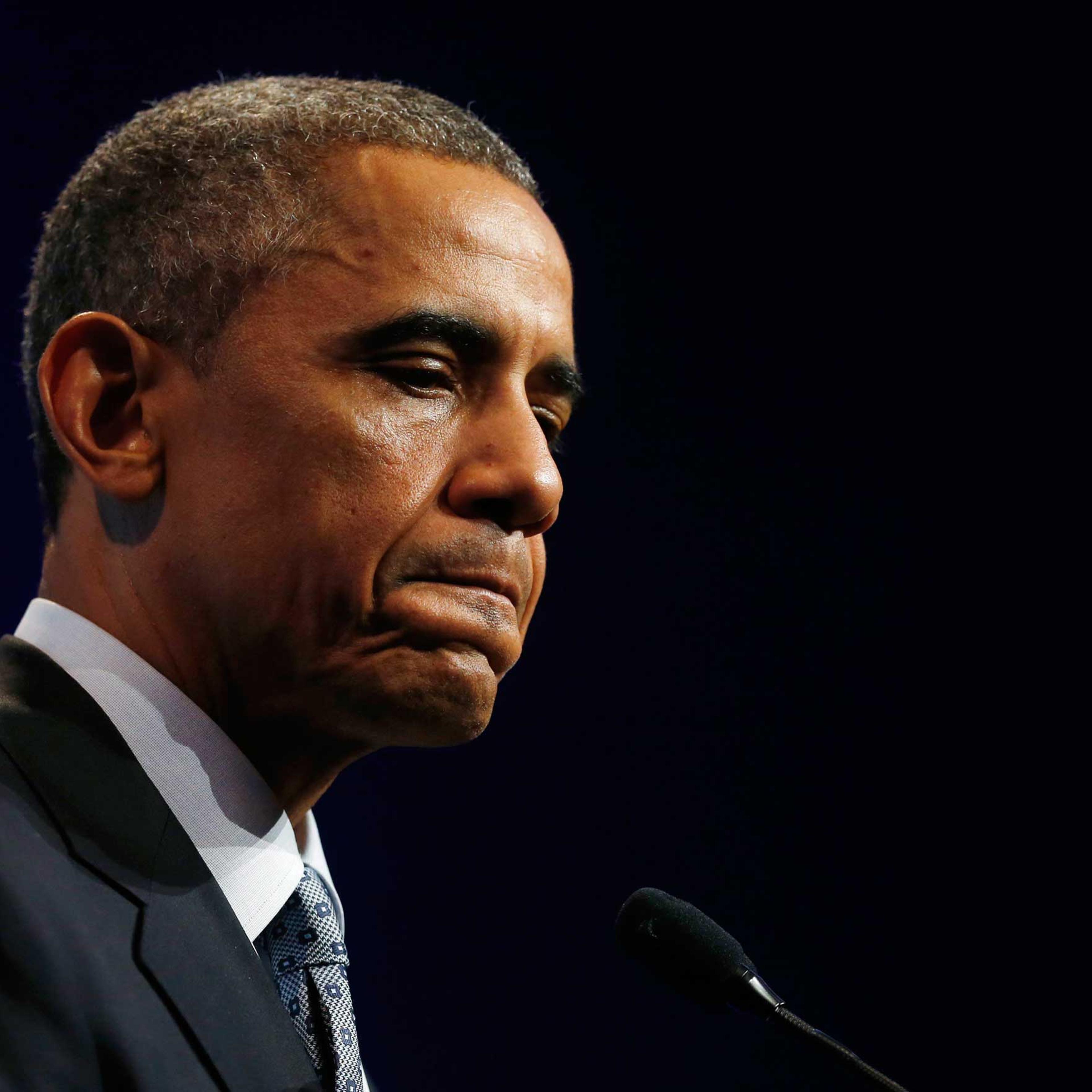 U.S. President Barack Obama listens to a question at a news conference at the end of the G20 summit in Brisbane
