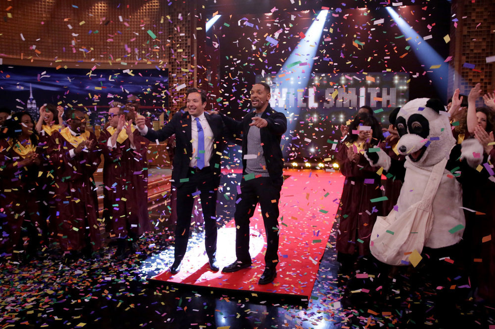 Jimmy Fallon celebrates with actor Will Smith on July 28, 2016.