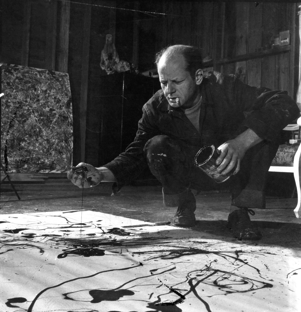 Jackson Pollock works in his Long Island studio, 1949.