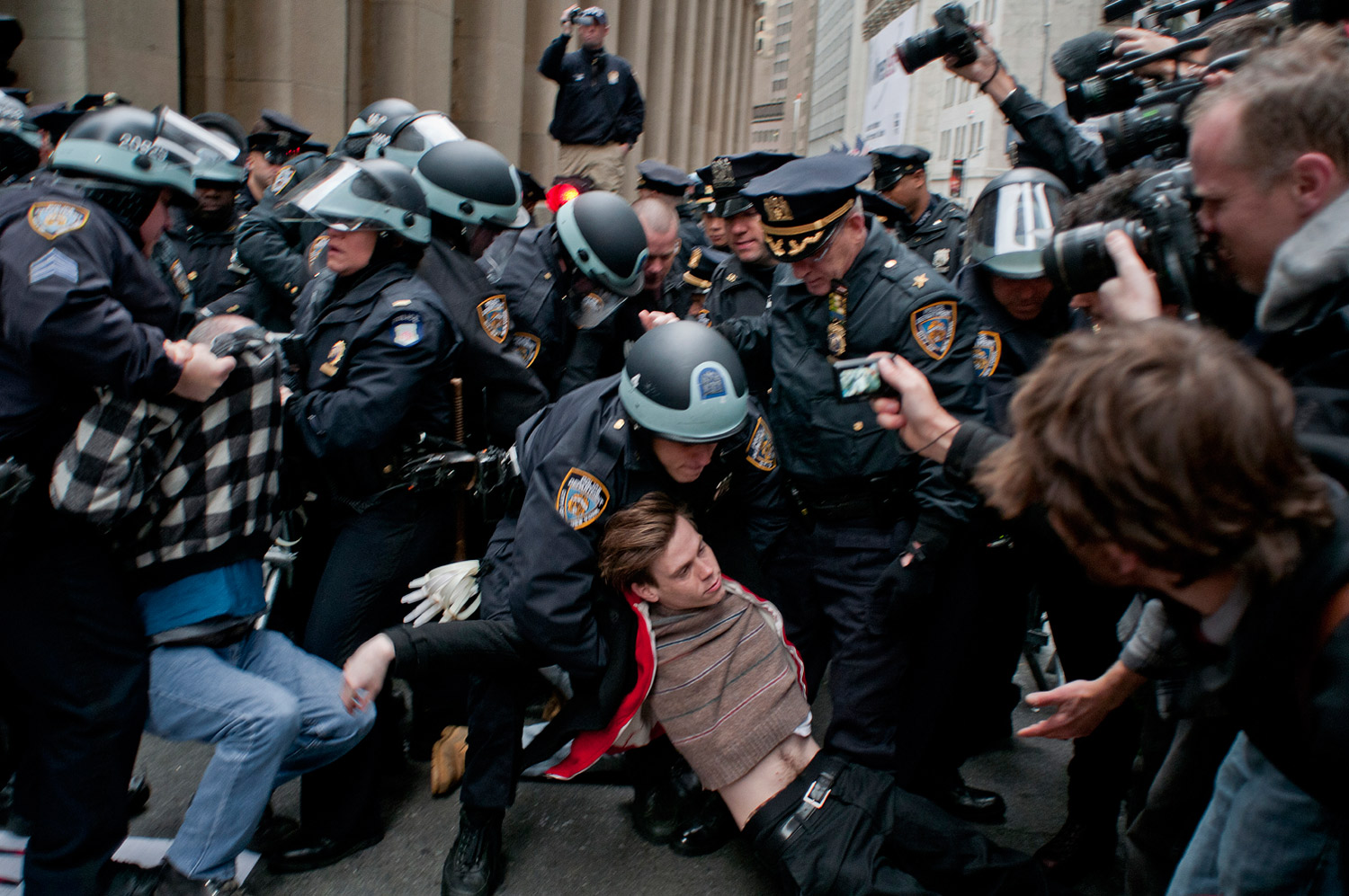 November 17, 2011. Arrests are made at the corner of Nassau Street and Pine Street in New York City.