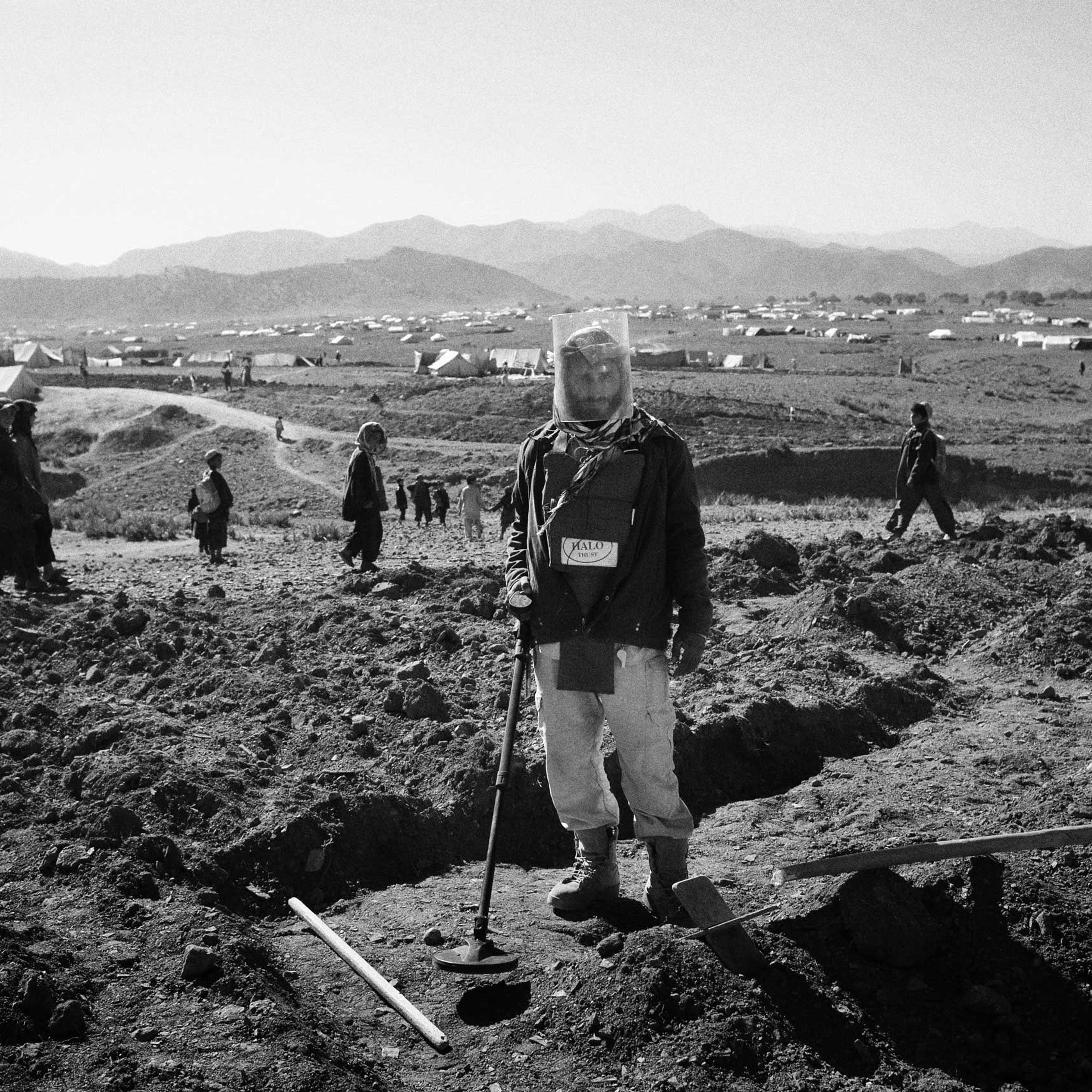 A de-miner from the NGO, Halo Trust works at a site in the Gulan refugee camp in Khost Province, Afghanistan. Halo Trust is one of the organisations responsible for the process which began after anti-tank mines and unexploded ordinance was discovered on