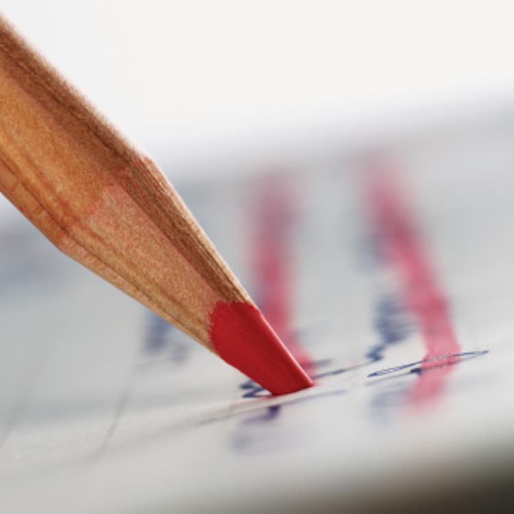 red-colored-pencil-crossing-out