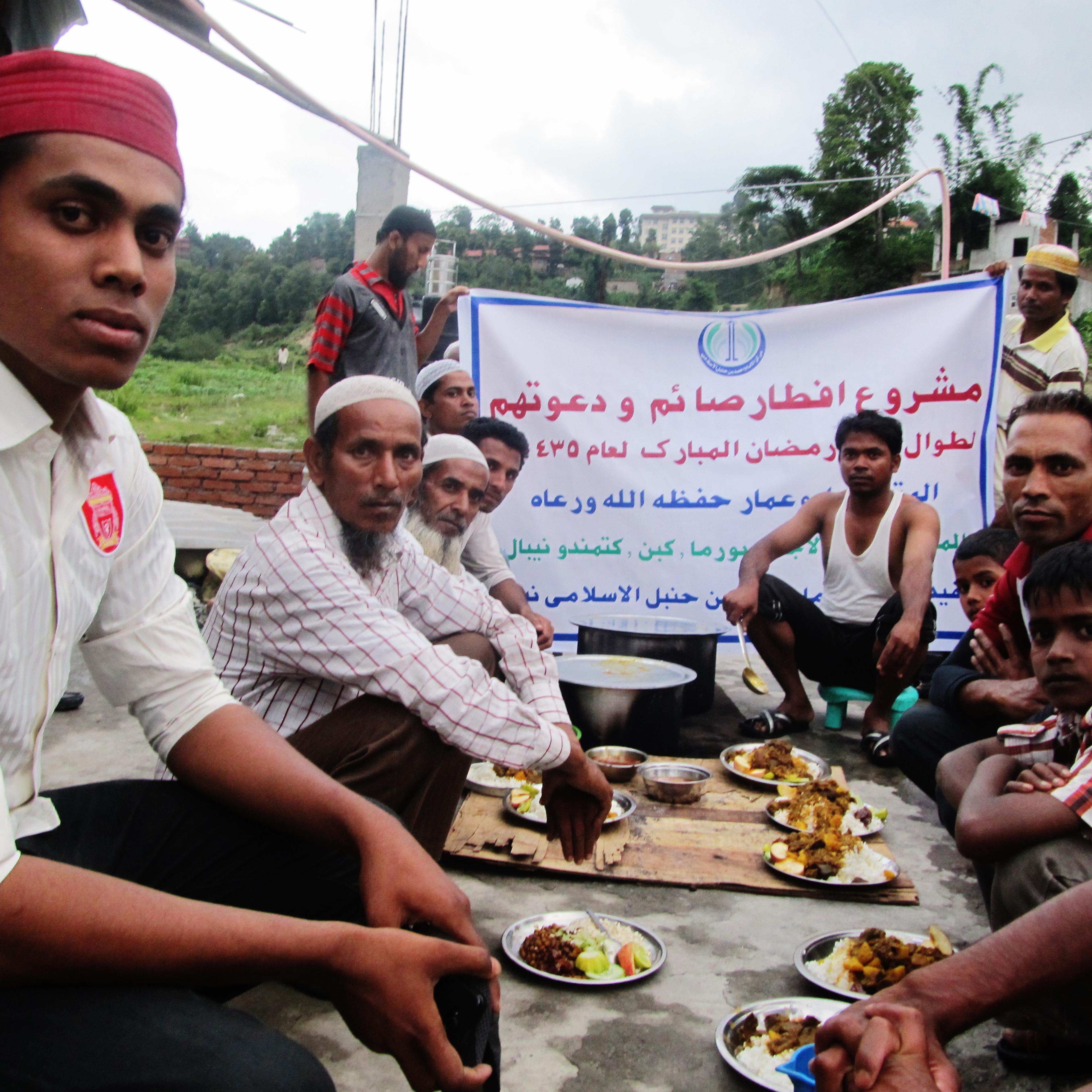 Hassan Hassan, left, and other Rohingya refugees on the outskirts of Kathmandu, Nepal