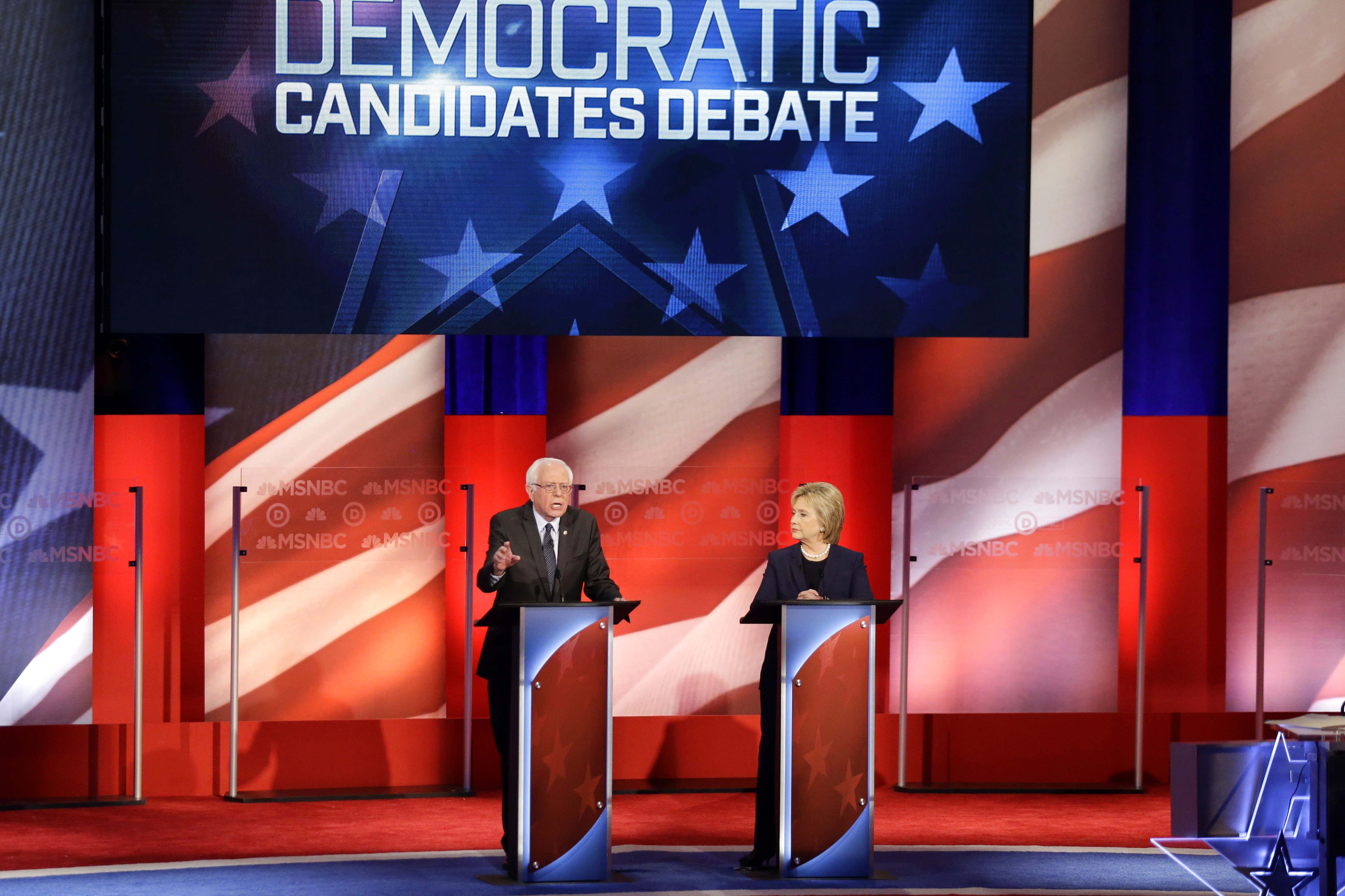 Democratic presidential candidates former Secretary of State Hillary Clinton and U.S. Sen. Bernie Sanders (I-VT) appear at a Democratic debate at the University of New Hampshire on Feb. 4, 2016 in Durham, N.H.