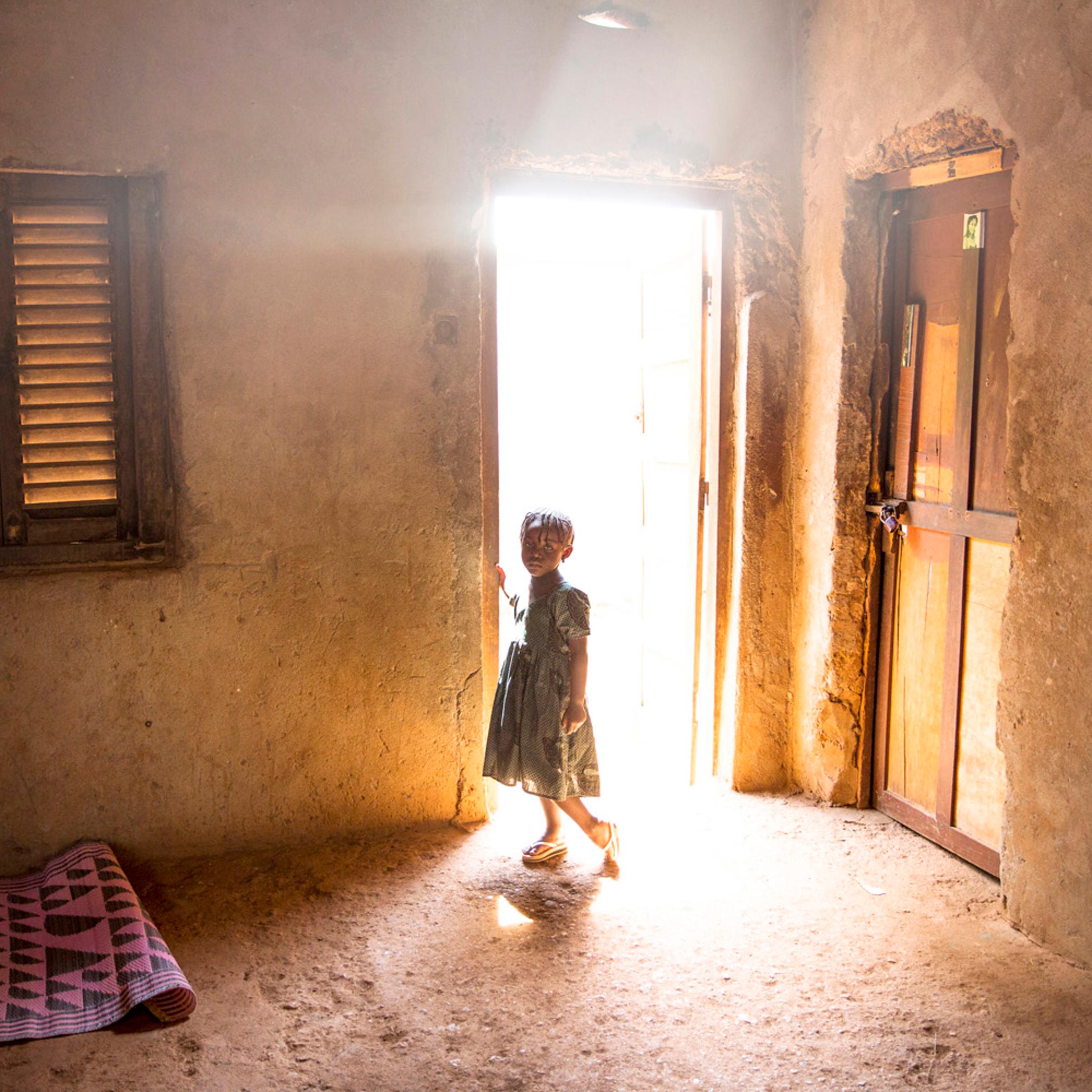 A young girl whose family member Fleuri Doumana, 21, was killed 2 days before by a grenade launched by a member of the Seleka. The rebel group that took power in March 2013 carries out numerous exactions such as murders, kidnapping, torture... Bangui.