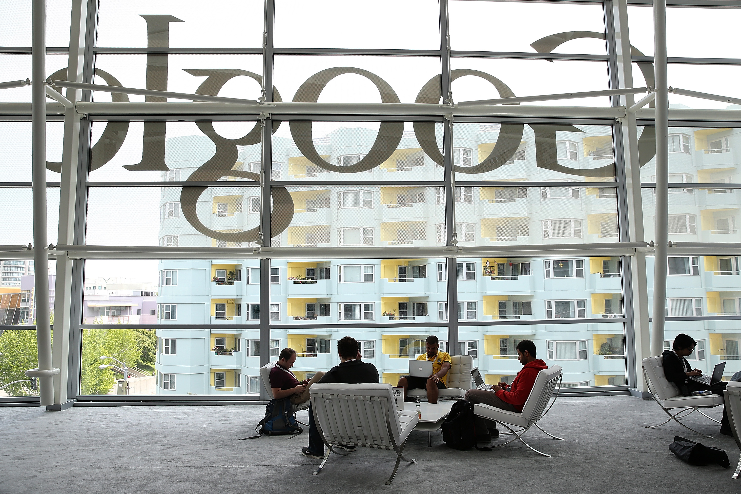 Attendees work on laptops during the Google I/O developers conference at the Moscone Center on May 15, 2013 in San Francisco.