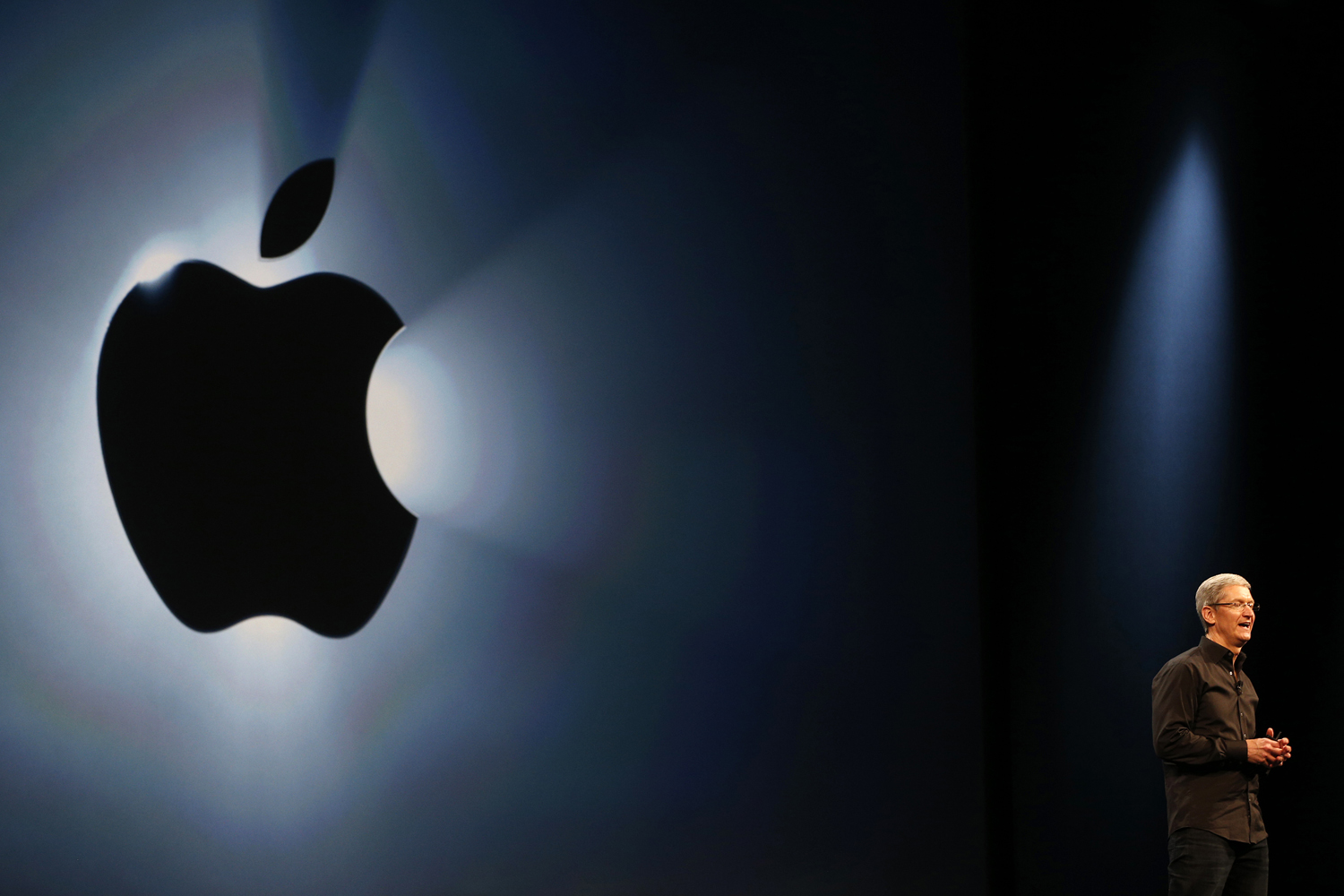 Apple Inc. CEO Tim Cook addresses the crowd during the Apple Worldwide Developers Conference (WWDC) 2013 in San Francisco