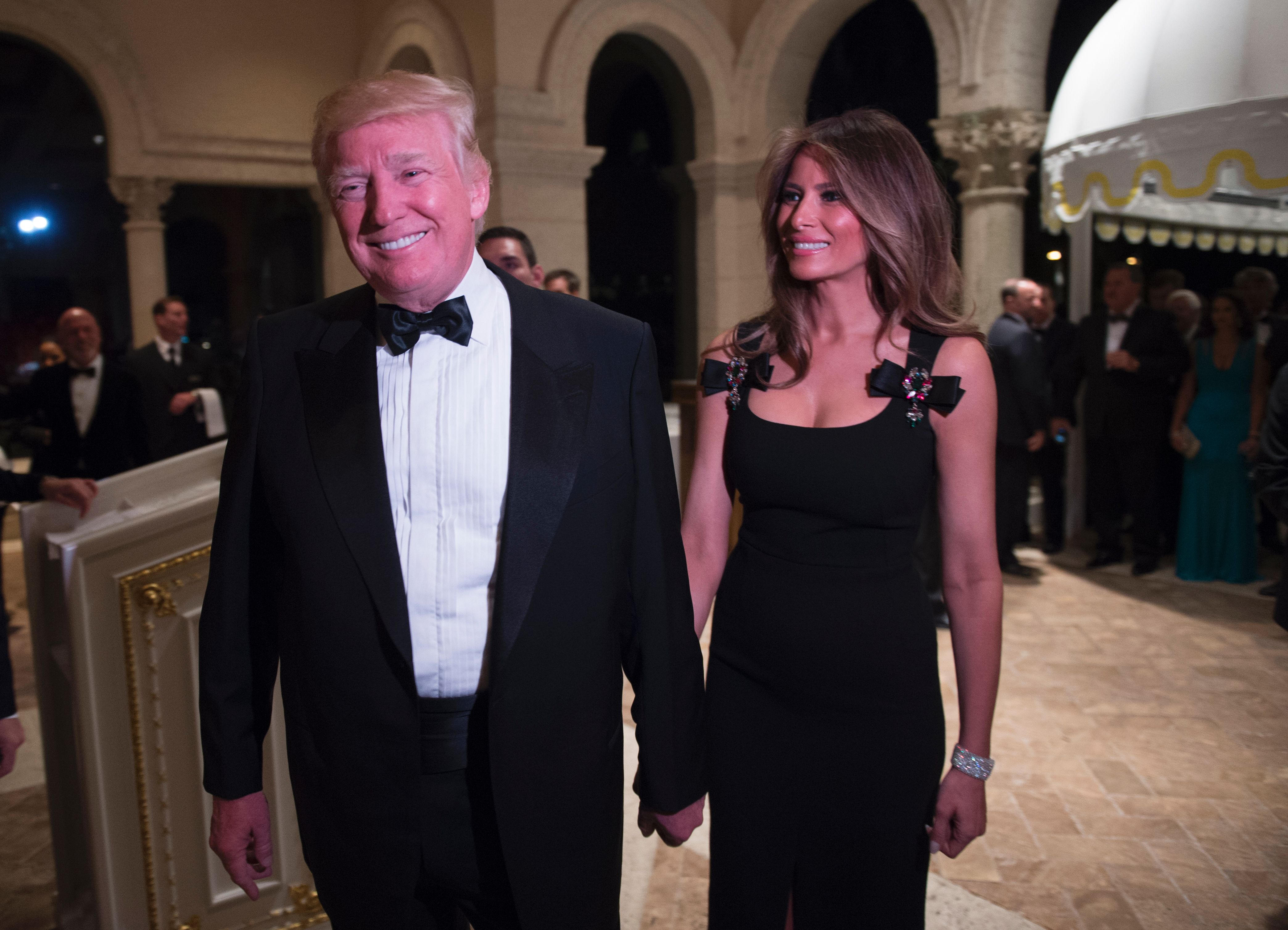 melania trump new years eve dress | US President Donald Trump and First Lady Melania Trump hosted a glamorous Year's party at the Mar-a-Lago resort in Florida. The Melania wears 'stunning' Versace gown