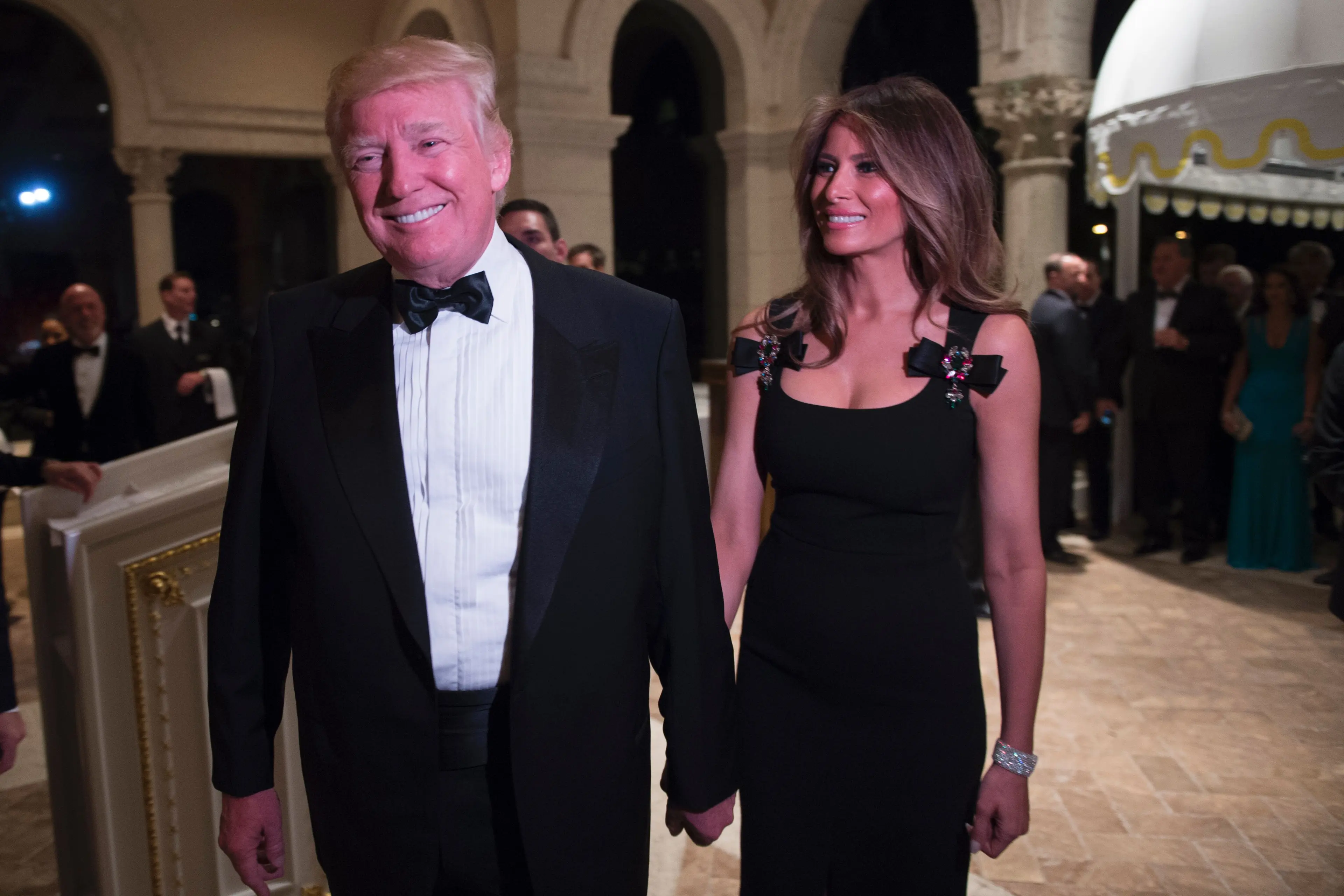 melania trump new years eve dress | US President Donald Trump and First Lady Melania Trump hosted a glamorous Year's party at the Mar-a-Lago resort in Florida. The Melania wears 'stunning' Versace gown