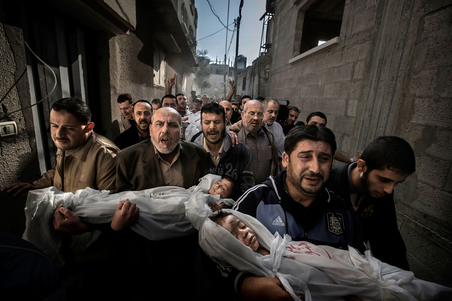 World Press Photo of the Year 2012. 20 November 2012, Gaza City, Palestinian Territories. Two-year-old Suhaib Hijazi and her three-year-old brother Muhammad were killed when their house was destroyed by an Israeli missile strike. Their father, Fouad, was