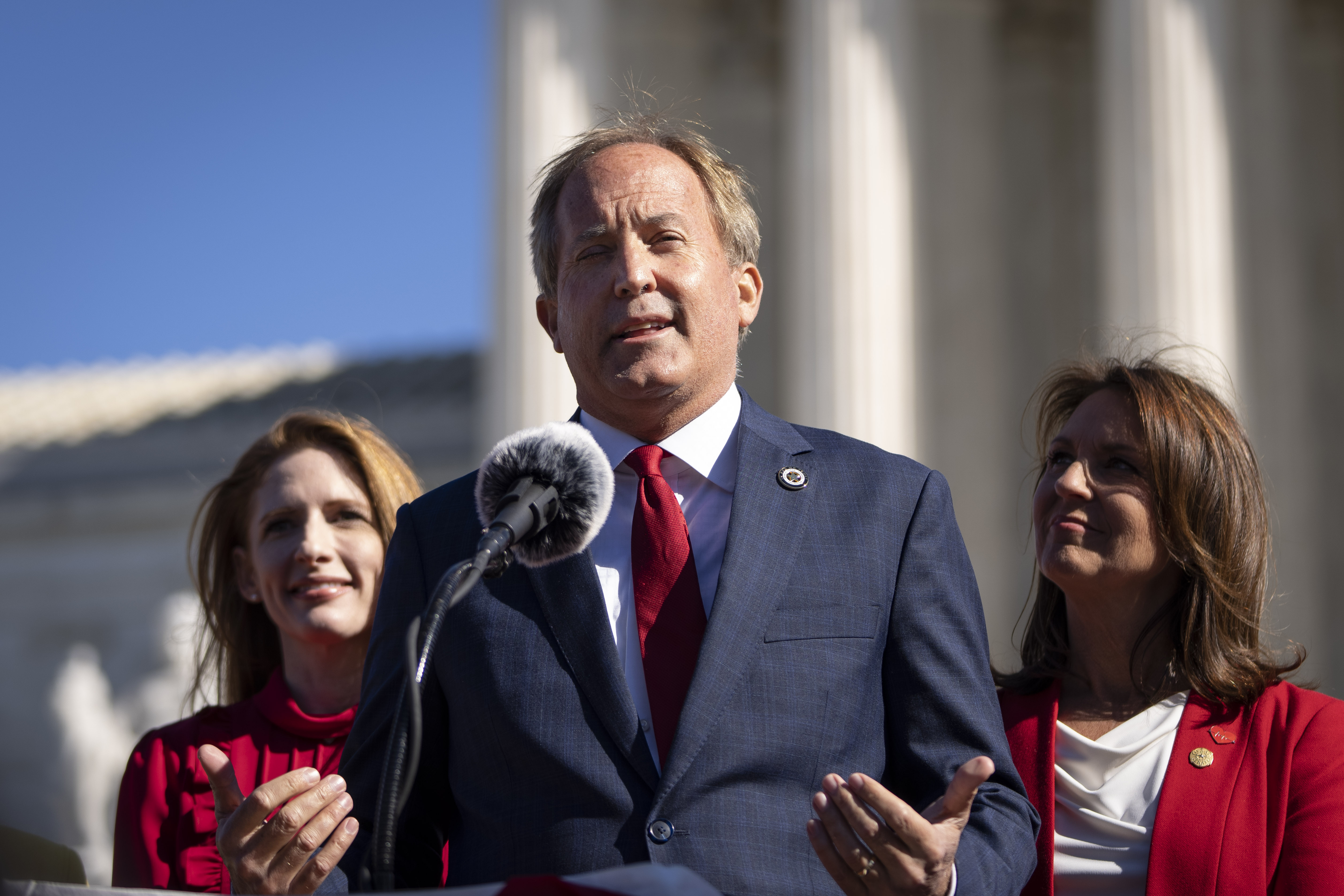 Texas Attorney General Ken Paxton speaks outside in Washington, DC.on U.S. Supreme Court on November 01, 2021.