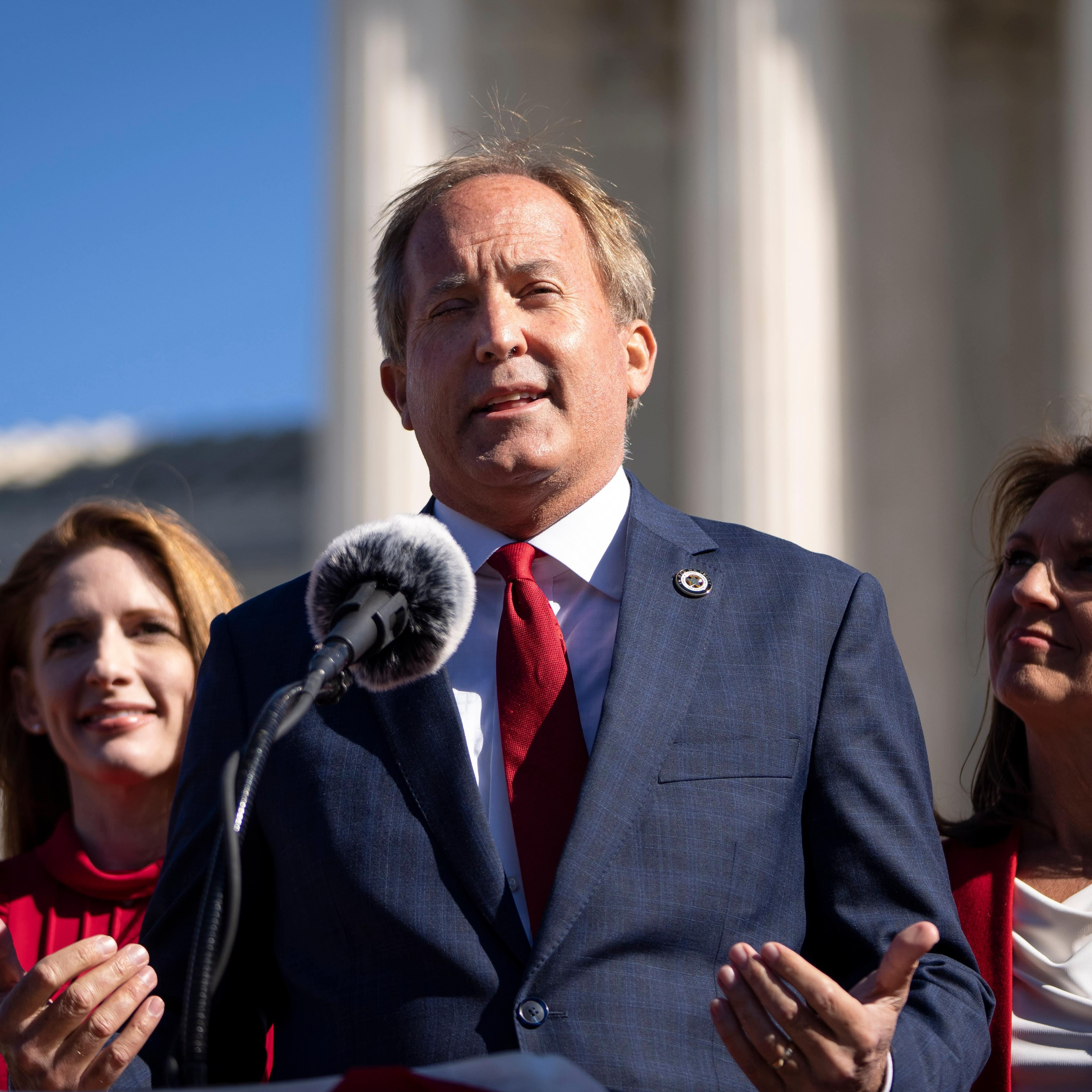 Texas Attorney General Ken Paxton speaks outside in Washington, DC.on U.S. Supreme Court on November 01, 2021.