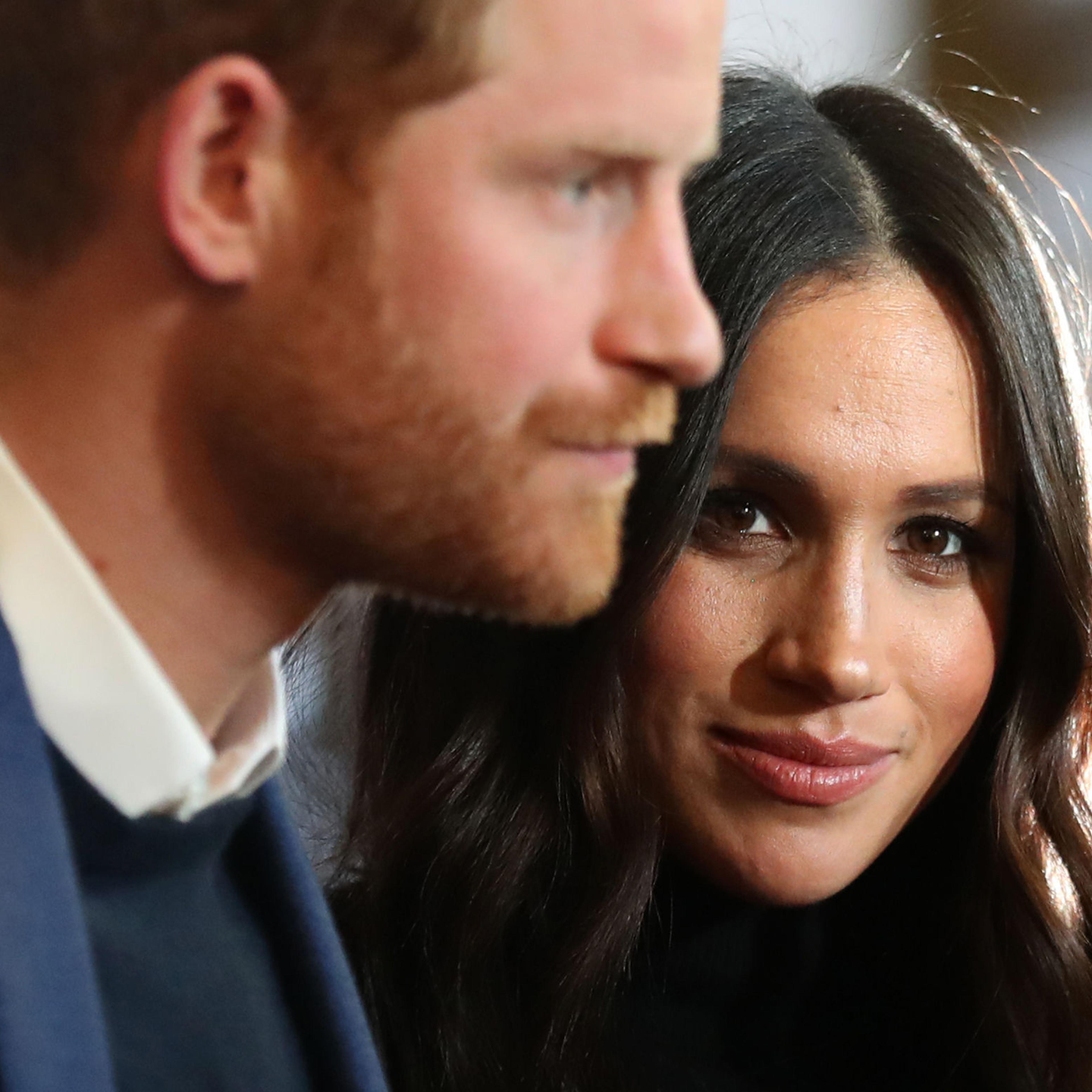 Prince Harry and Meghan Markle attend a reception at the Palace of Holyroodhouse on Feb. 13, 2018 in Edinburgh, Scotland.