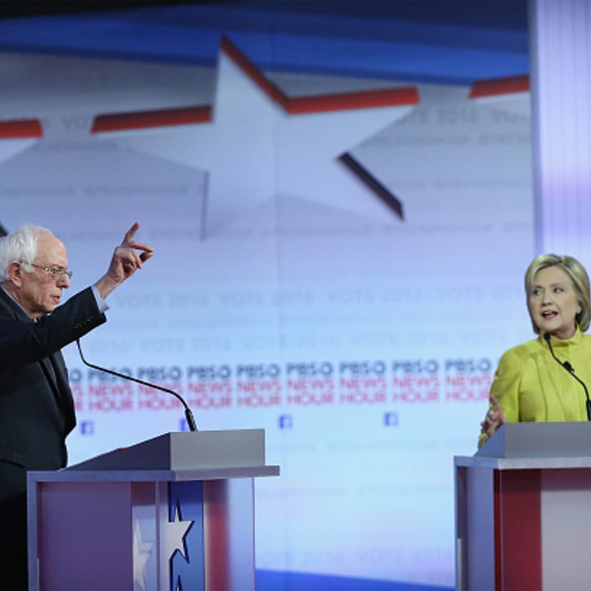 Democratic presidential candidates Senator Bernie Sanders (L) and Hillary Clinton participate in the PBS NewsHour Democratic presidential candidate debate at the University of Wisconsin-Milwaukee in Milwaukee on Feb. 11, 2016.