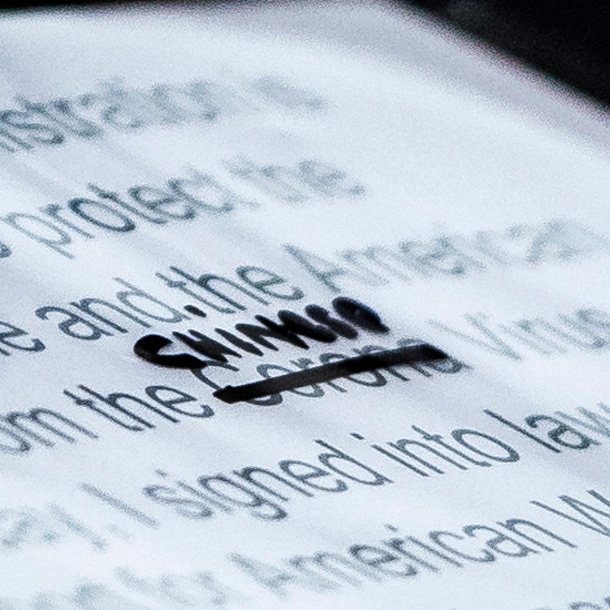 A close-up of President Trump's notes shows where the word "Corona" was crossed out and replaced with "Chinese" during a briefing at the White House on March 19, 2020.