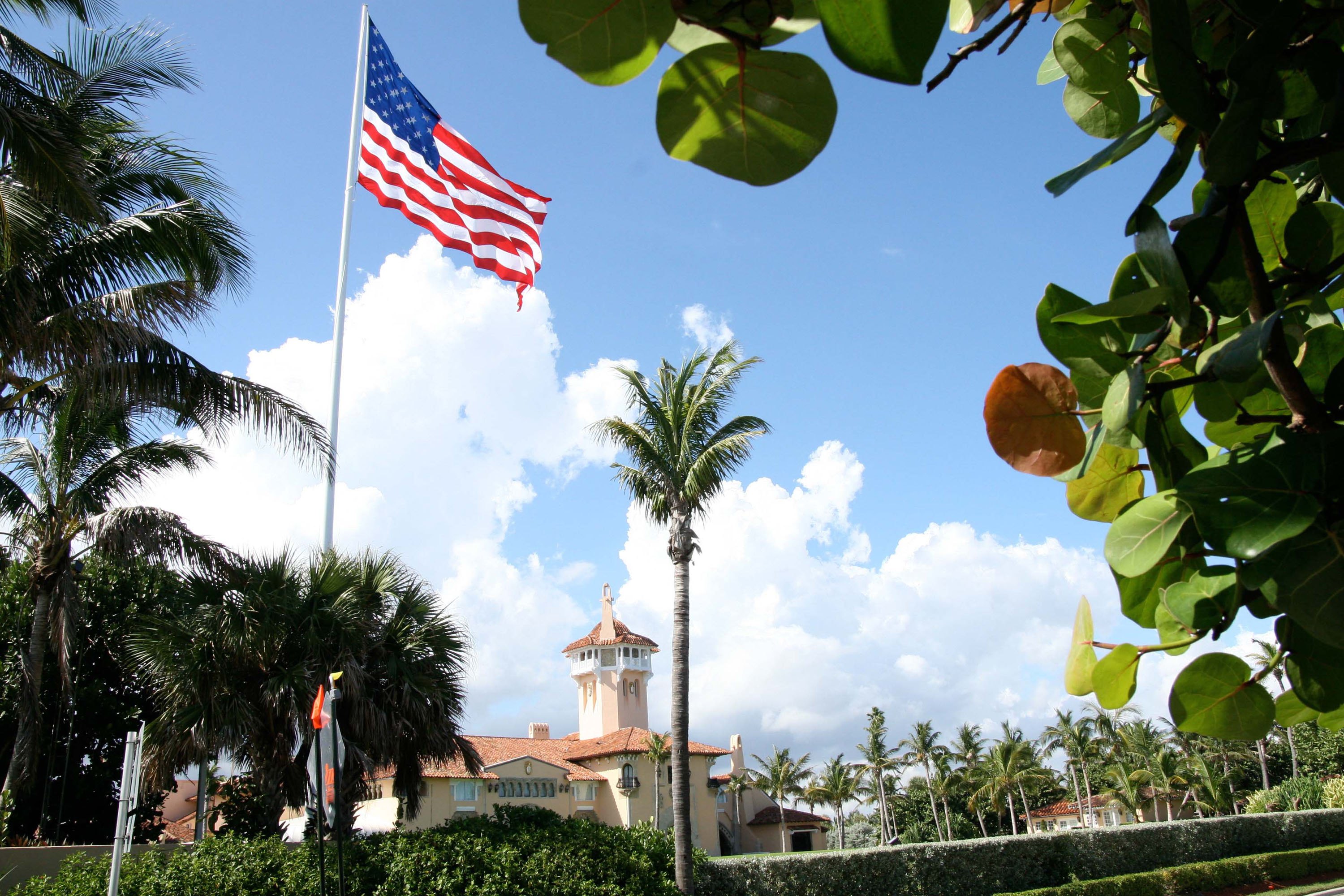 Palm Beach Cites Trump Over Flag