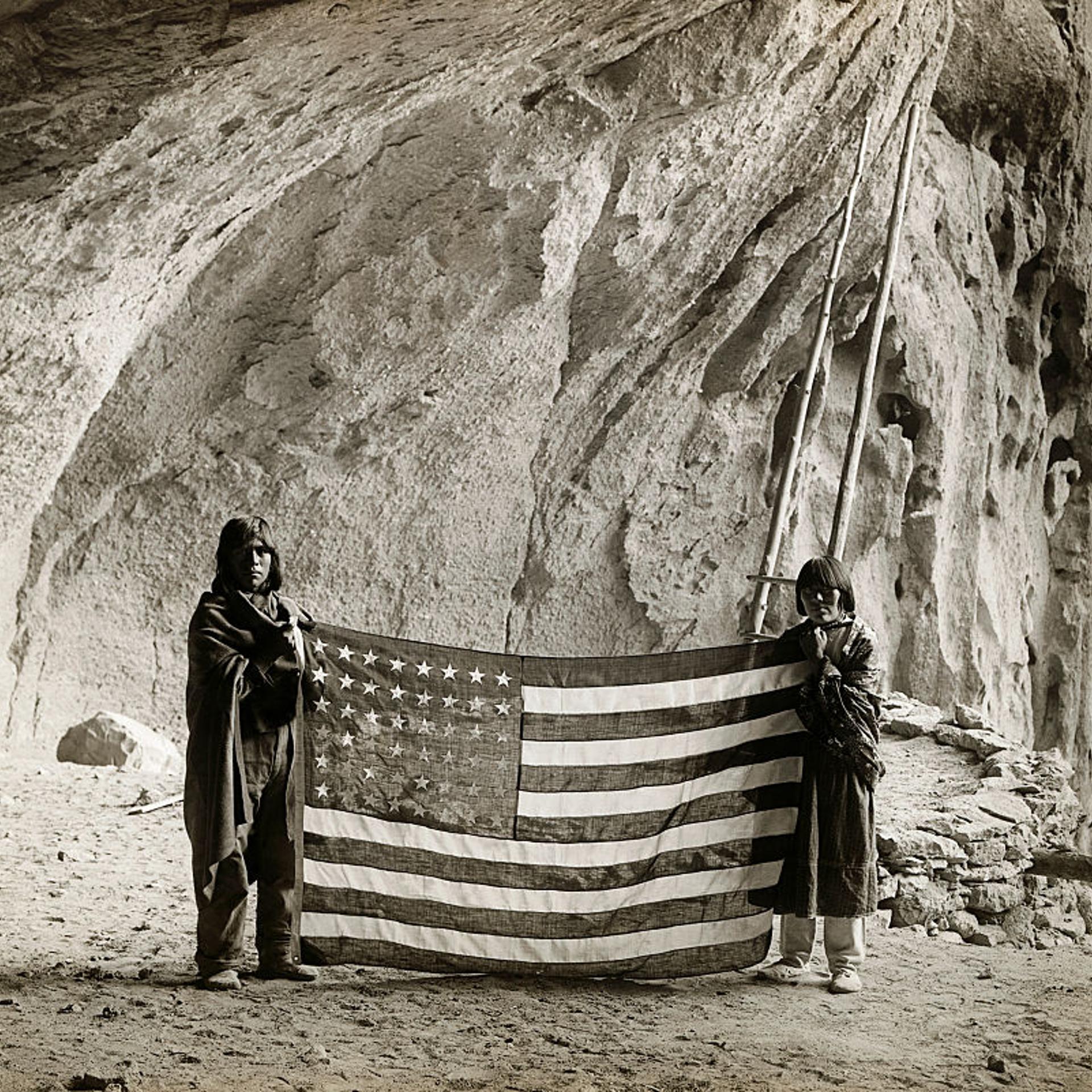 Pueblo Indigenous people at the Ceremonial Cave of the Frijoles Canyon in New Mexico