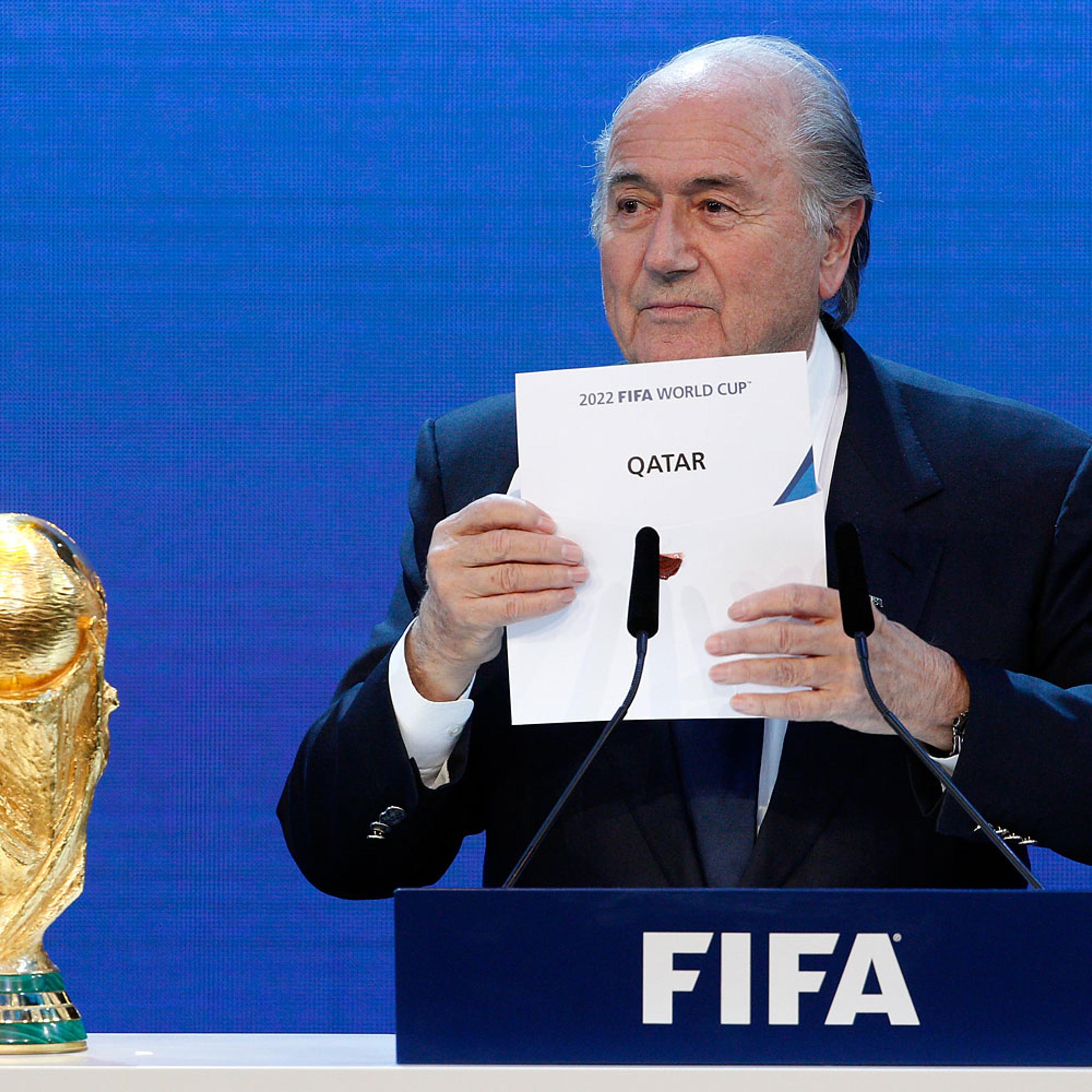 FIFA President Sepp Blatter announces Qatar as the host nation for the FIFA World Cup 2022 in Zurich