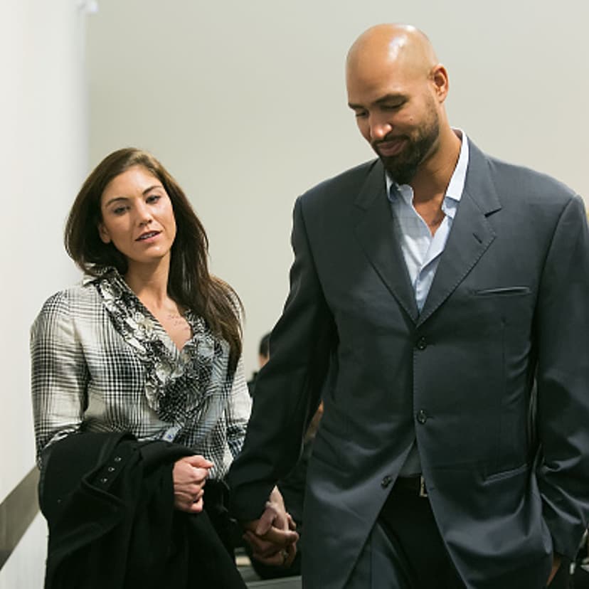 Hope Solo and husband Jerramy Stevens exit the court room at Kirkland Municipal Court in Washington on Nov. 4, 2014