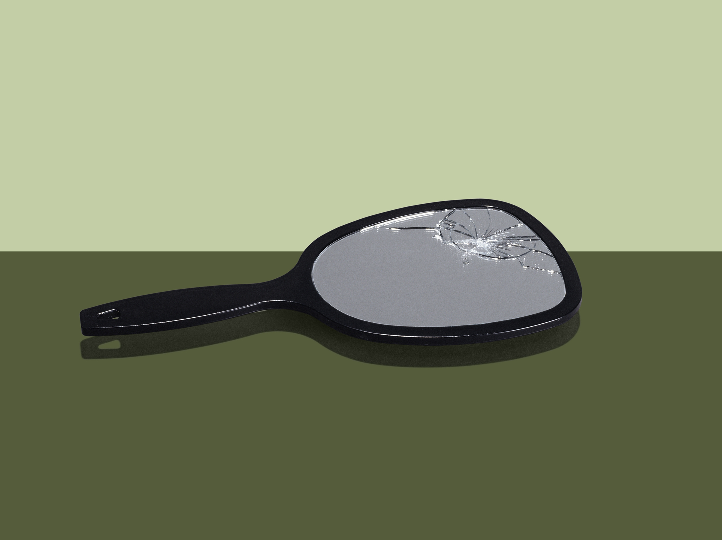 Broken hand mirror